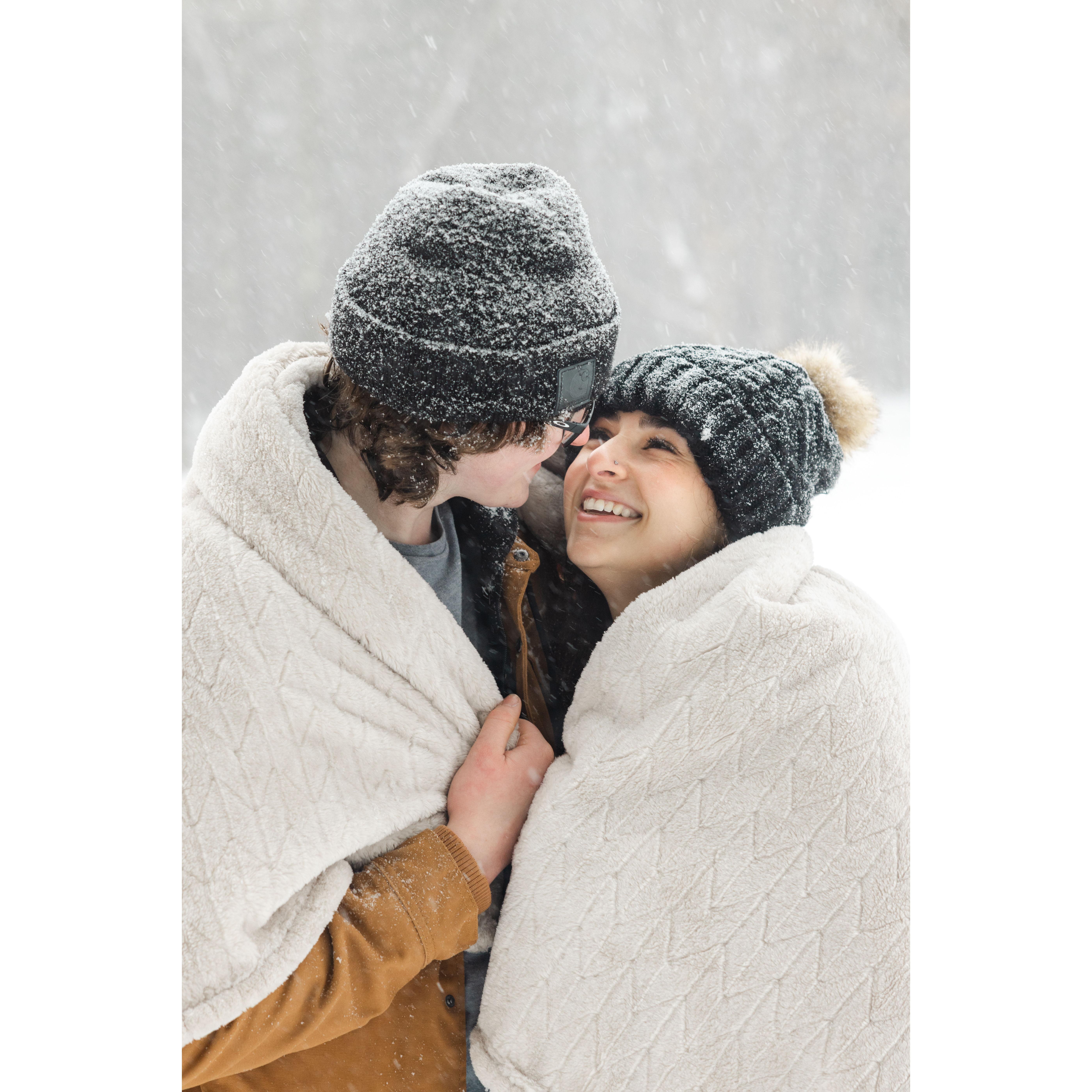 From our snowy engagement session with our wedding photographer (Caitlin Miller Photography) during the biggest storm that season!