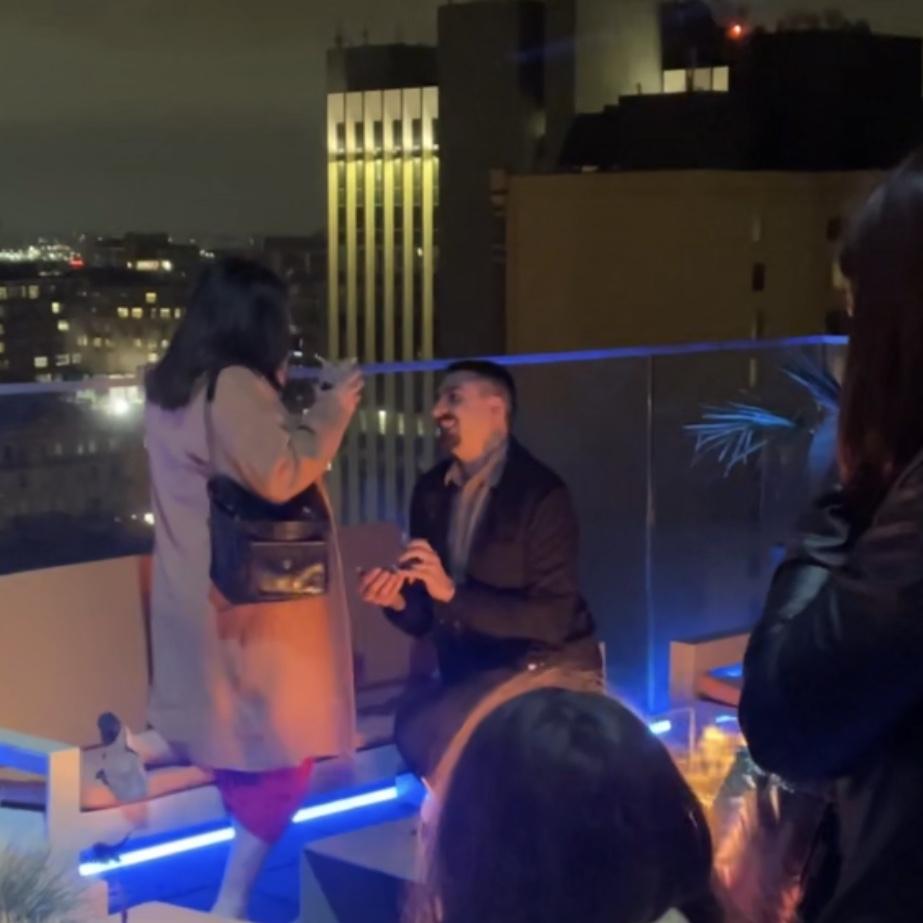Kolby had Sara's best friends—Maid of Honor Stacey and Bridesmaid Angileah, along with her daughters who are in the wedding—secretly hide out at the surprise engagement. They captured photos of the couple as Kolby proposed to Sara.