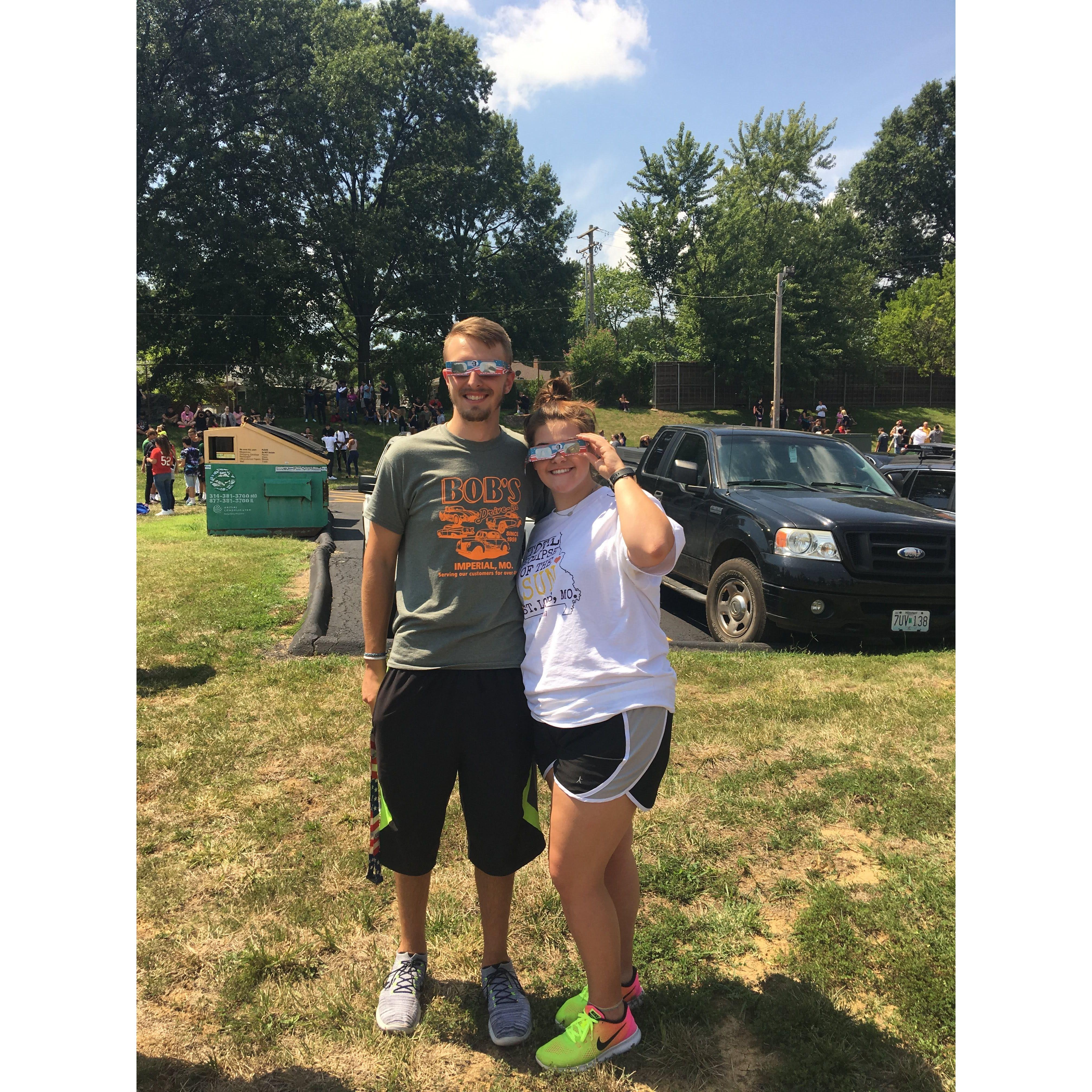 Us watching the Solar Eclipse on the baseball feilds at school