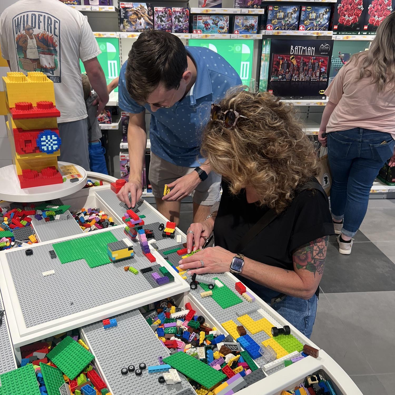 Megan's mom (Faith) and Christopher playing Legos together.