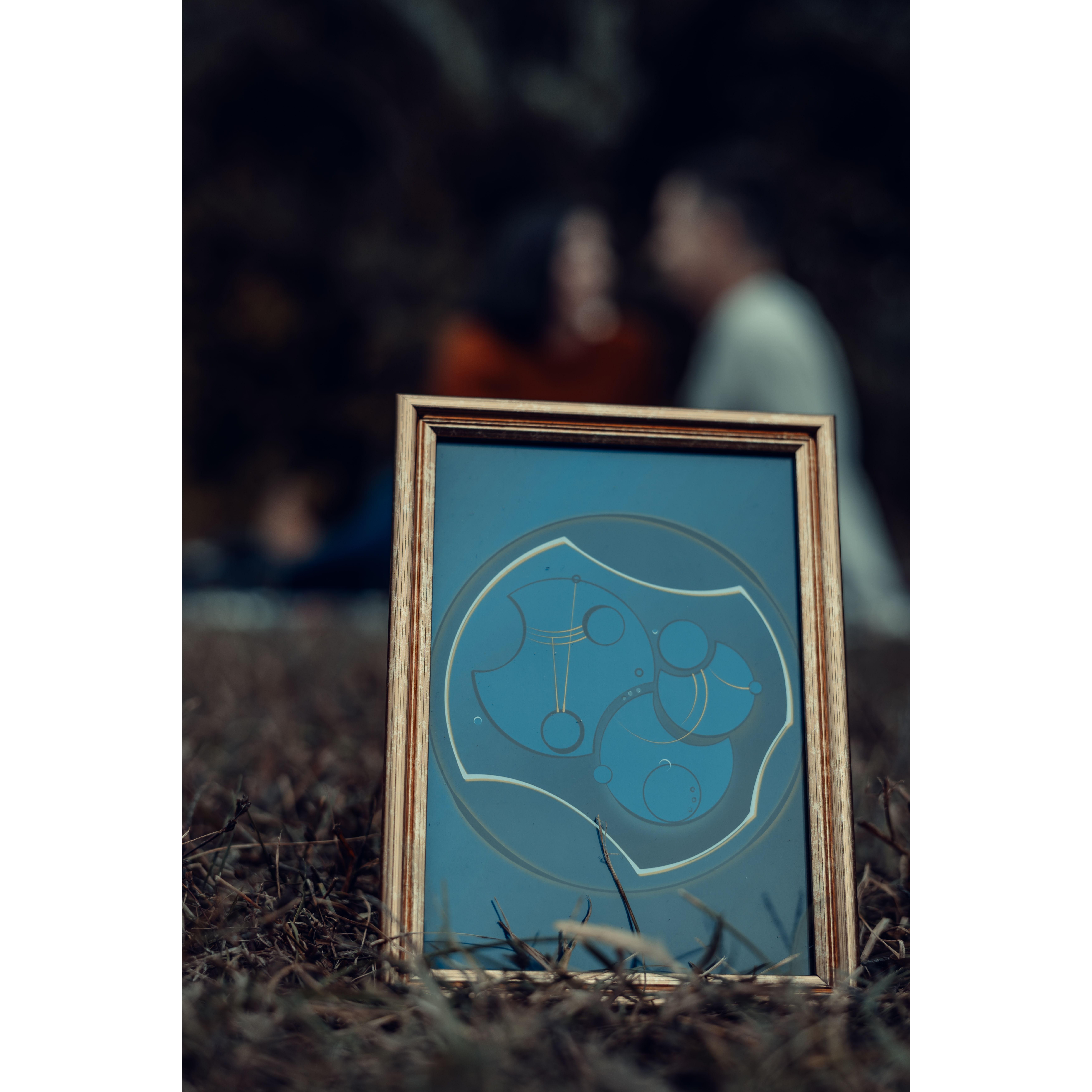This symbol is Gallifreyan (the Doctor's language) and means "Love is a promise." Peter designed this for B as a Christmas gift.