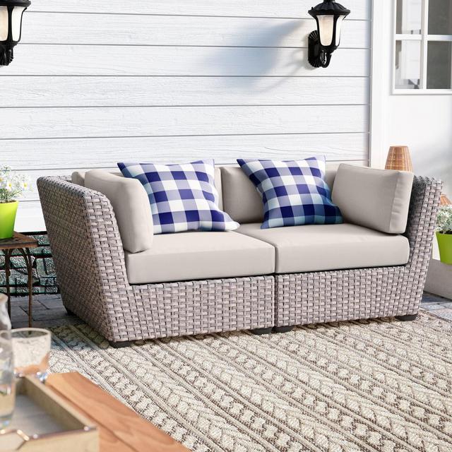Merlyn Outdoor Wicker Patio Sofa with Cushions