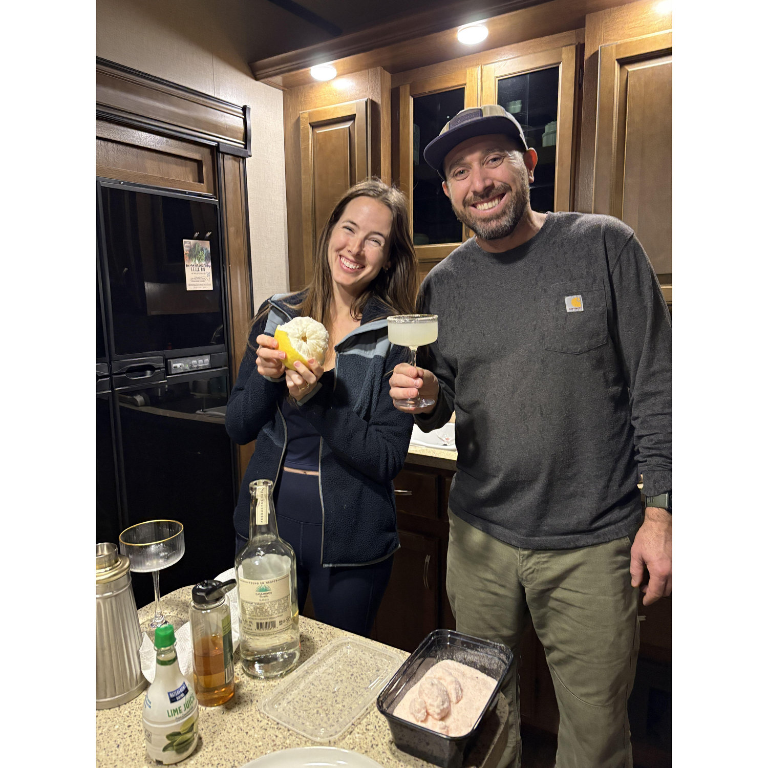 Making margys with our first grapefruit from the garden.