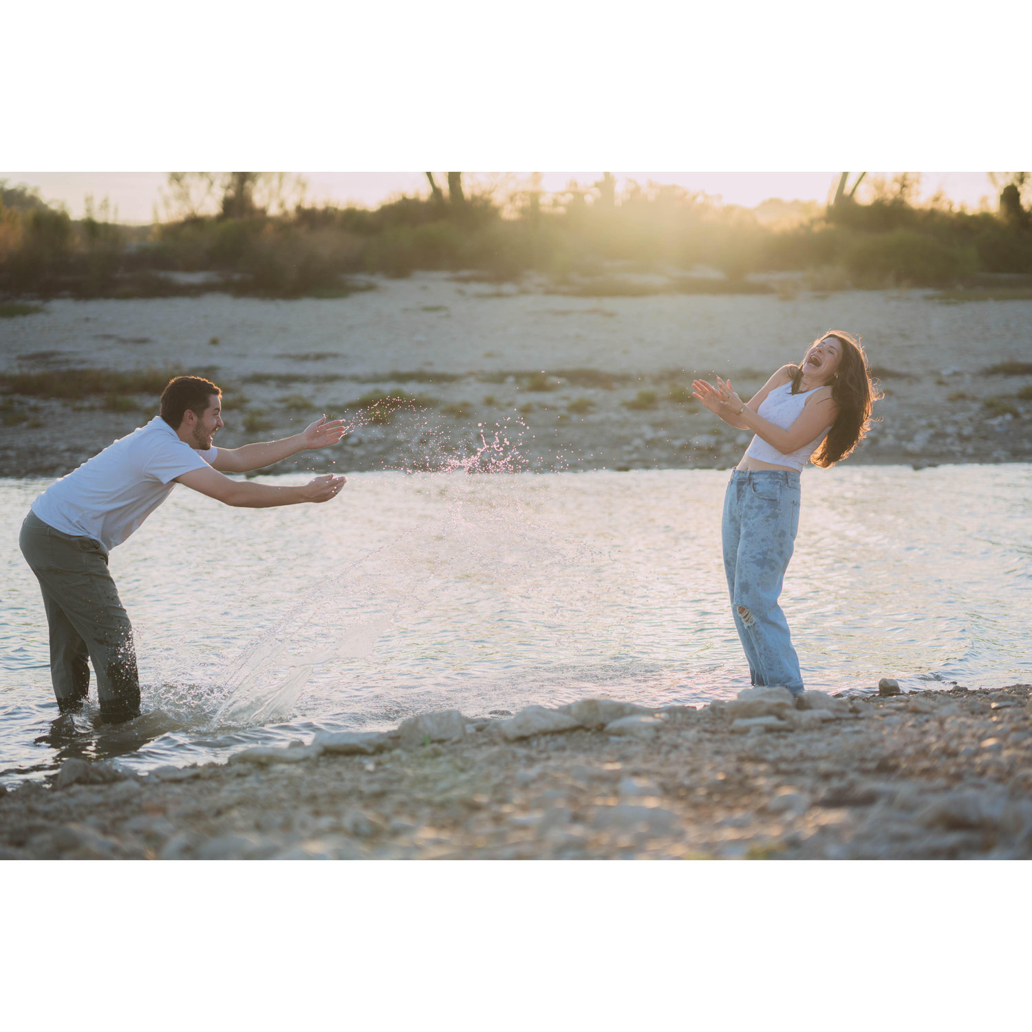 Our sweet photographer said "lightly" splash each other... Jake went HEAVY splash...