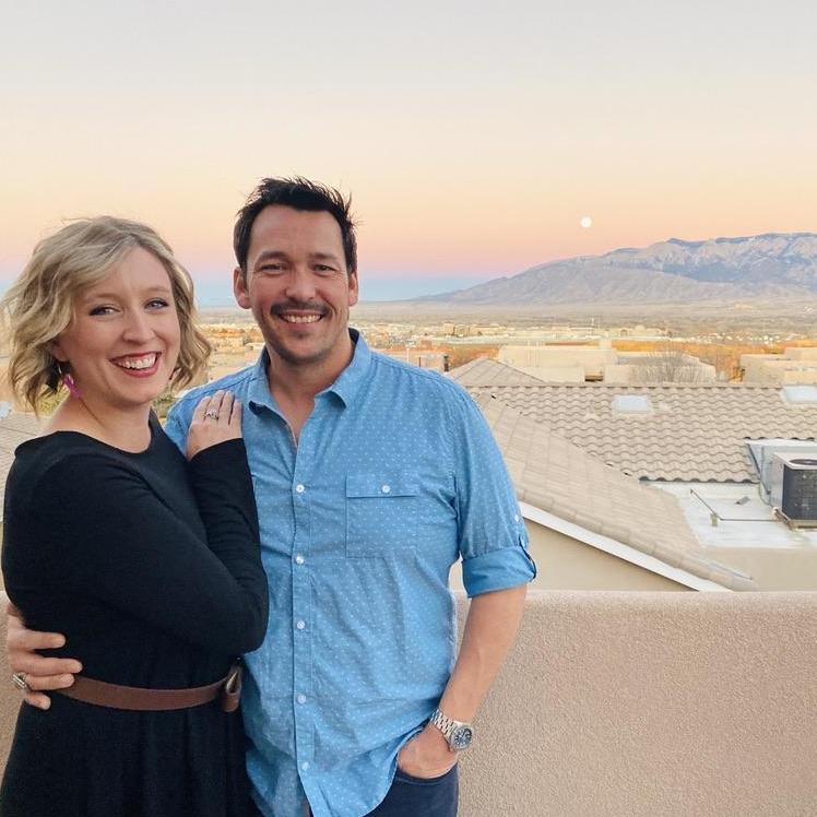 The sun going down, and the moon rising in Albuquerque, New Mexico, with Sandia Mountain in the background ⛰️