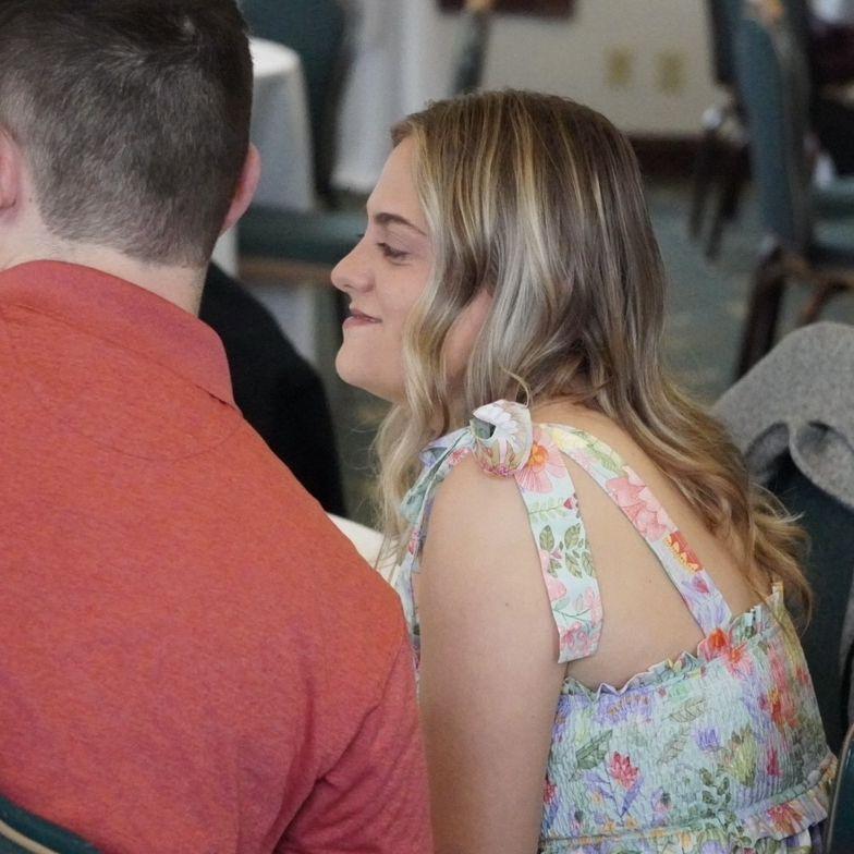 When a friend snuck a picture of us at my brother in law and sister-in-law's wedding.