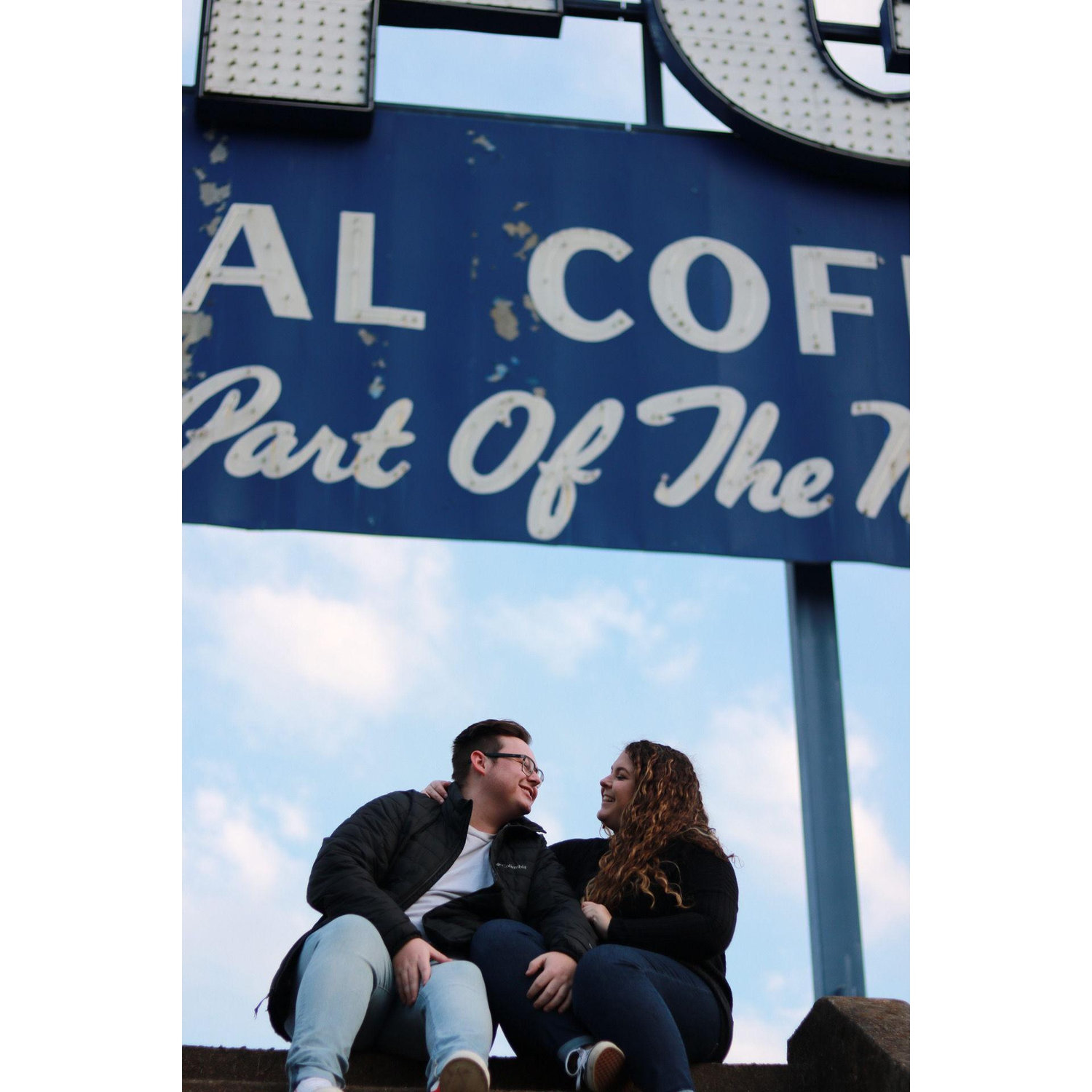 Took some photos in front of the JFG sign