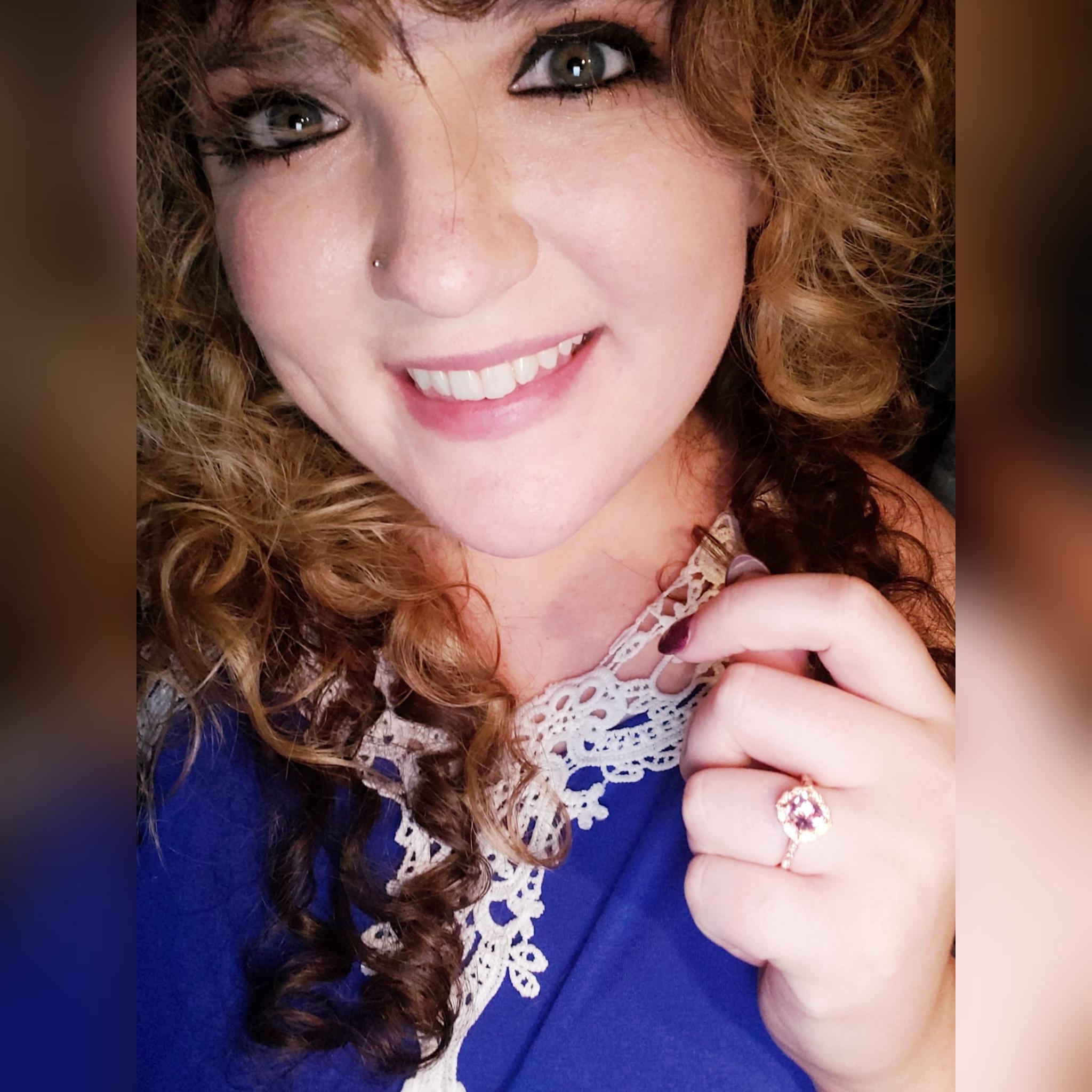 This is from the night we got engaged. Of course I had to show off my beautiful ring!!