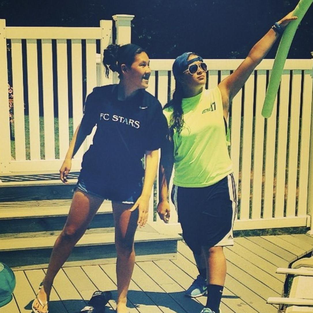 Becca & Kayla posing before a pool day