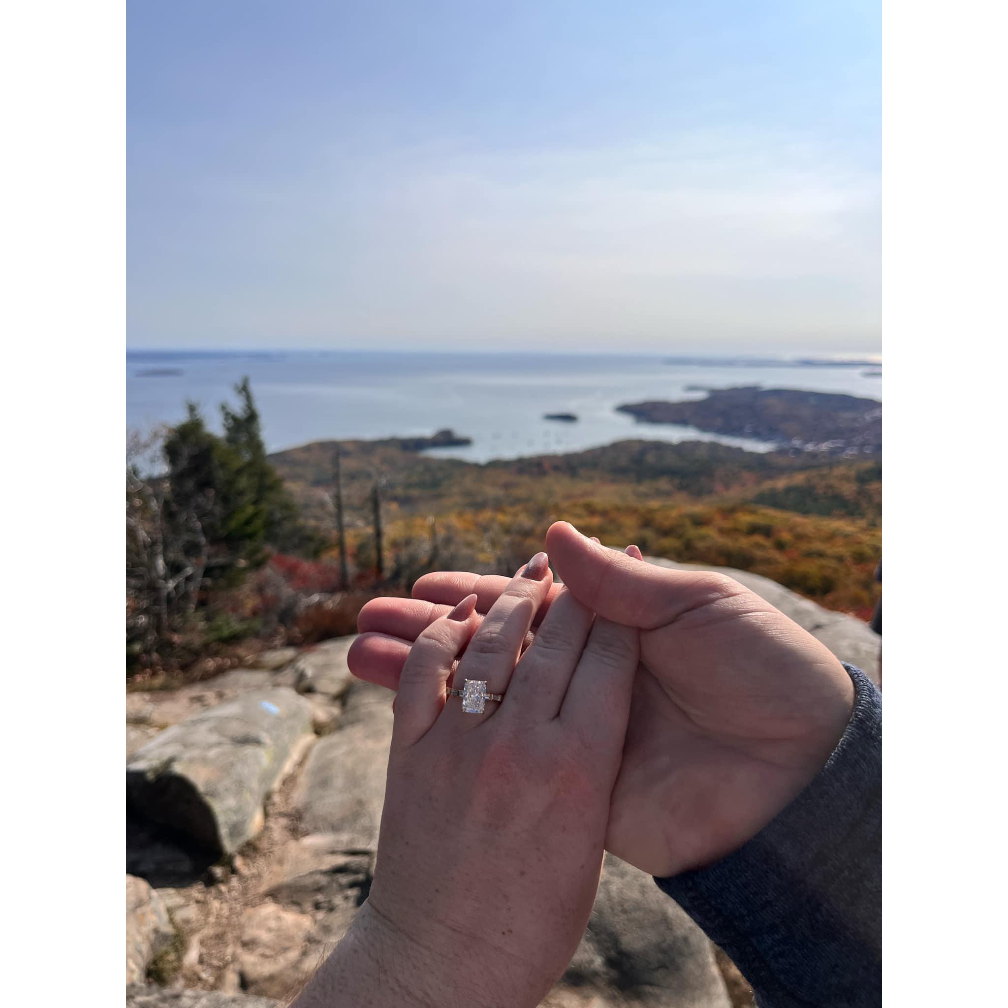 October 2024: A moment for the ring! Dan also hid our birthstones side by side on the inside of ring, under the diamond. I cried all over again when I saw this a little later.