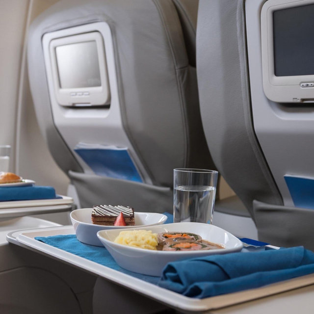 Upgrade Our Plane Tickets