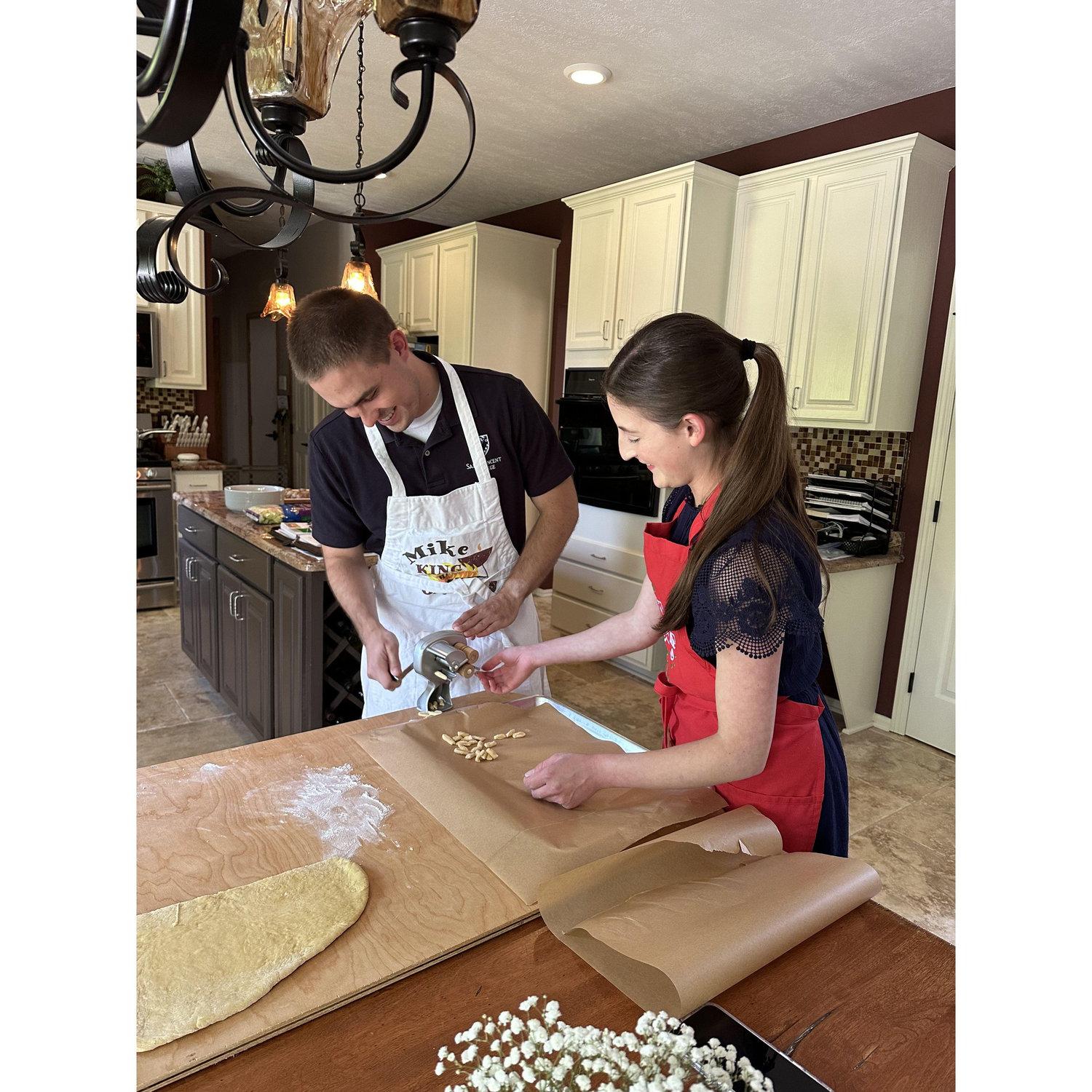 Olivia teaching Paul how to make cavatelli. The end pieces are the best!