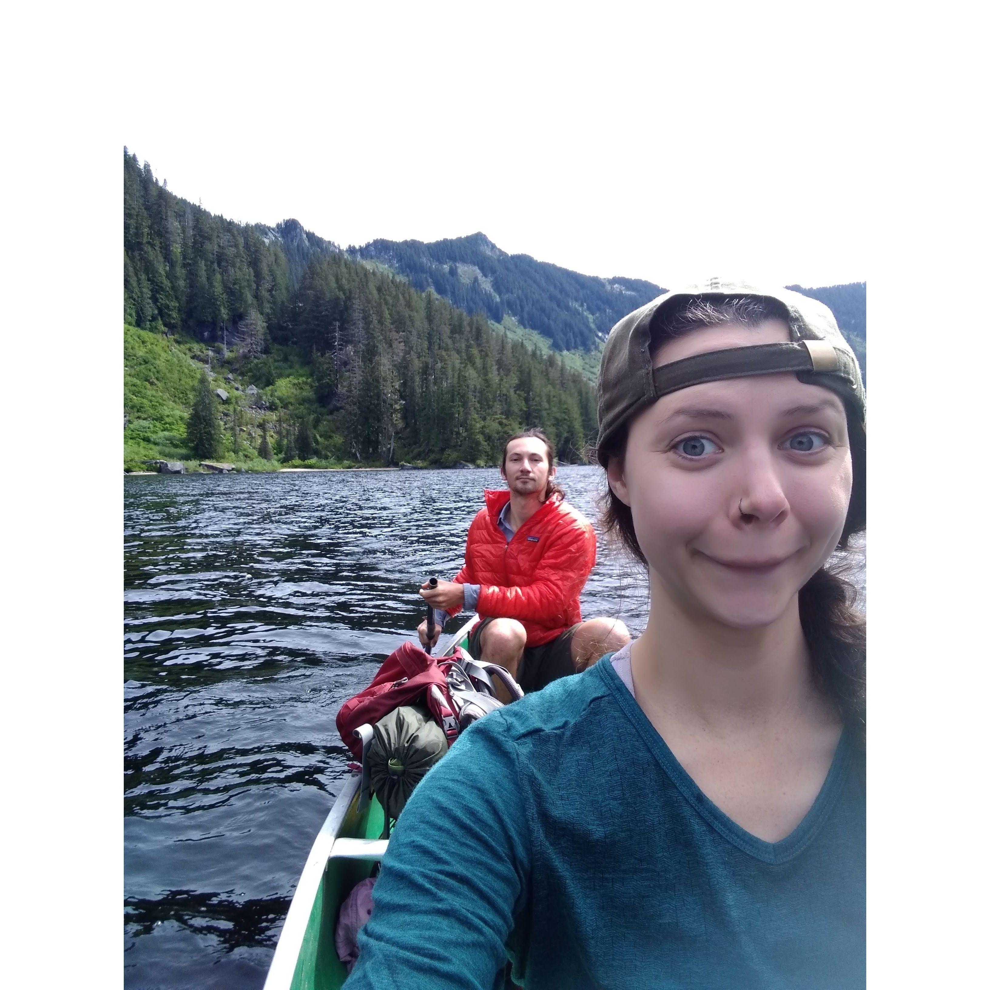 Canoeing across an alpine lake on our annual backpacking trip up to Lake Isabel