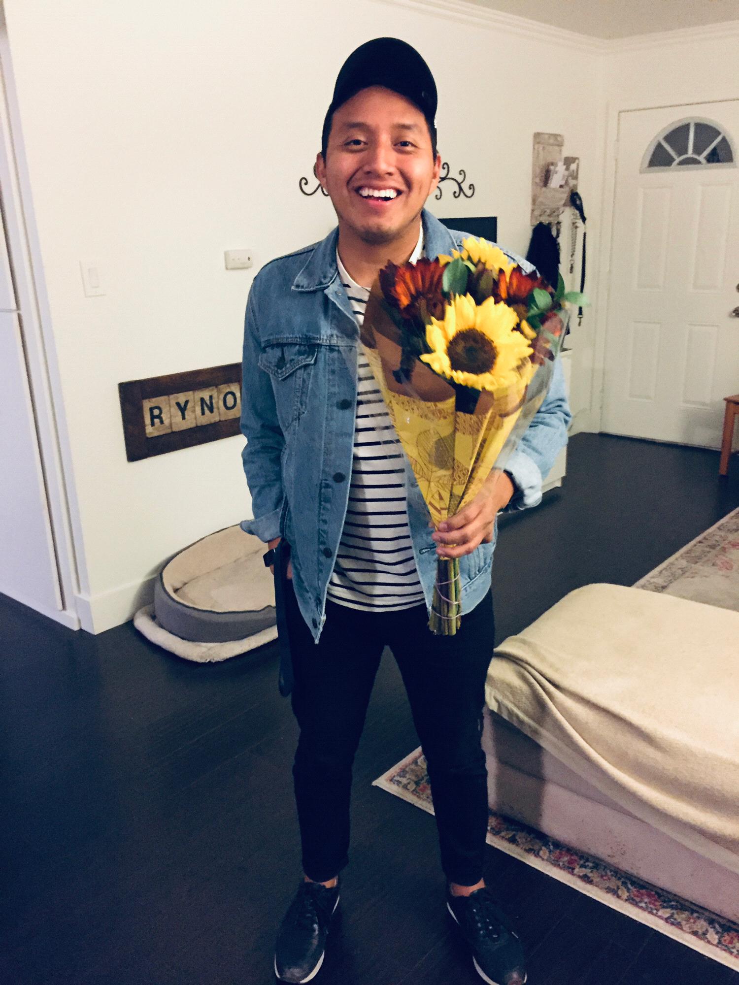 February 2019 - Manny bringing me flowers...Look at his cute smile!
Huntington Beach, California