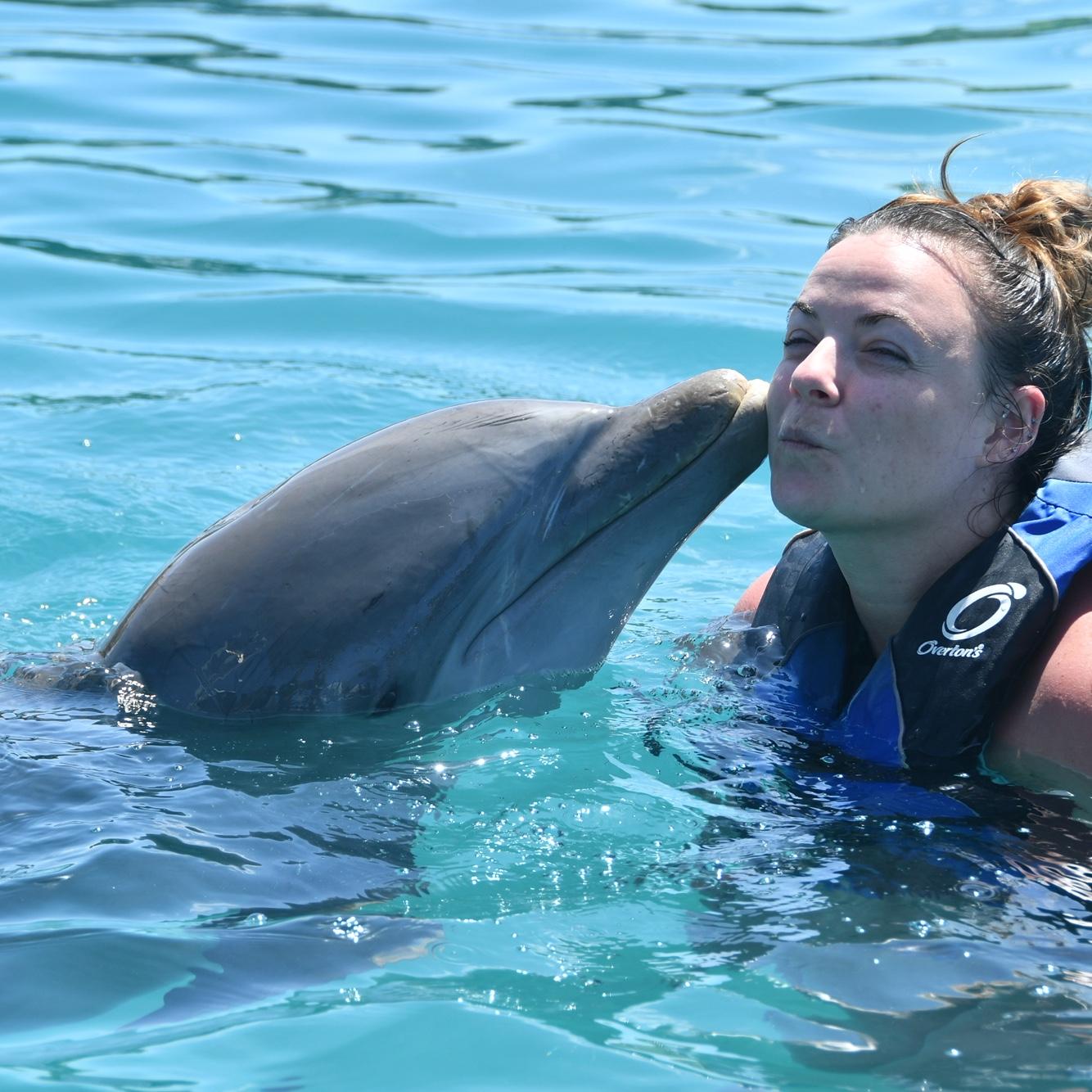 Kissing dolphins on one of our adventures!