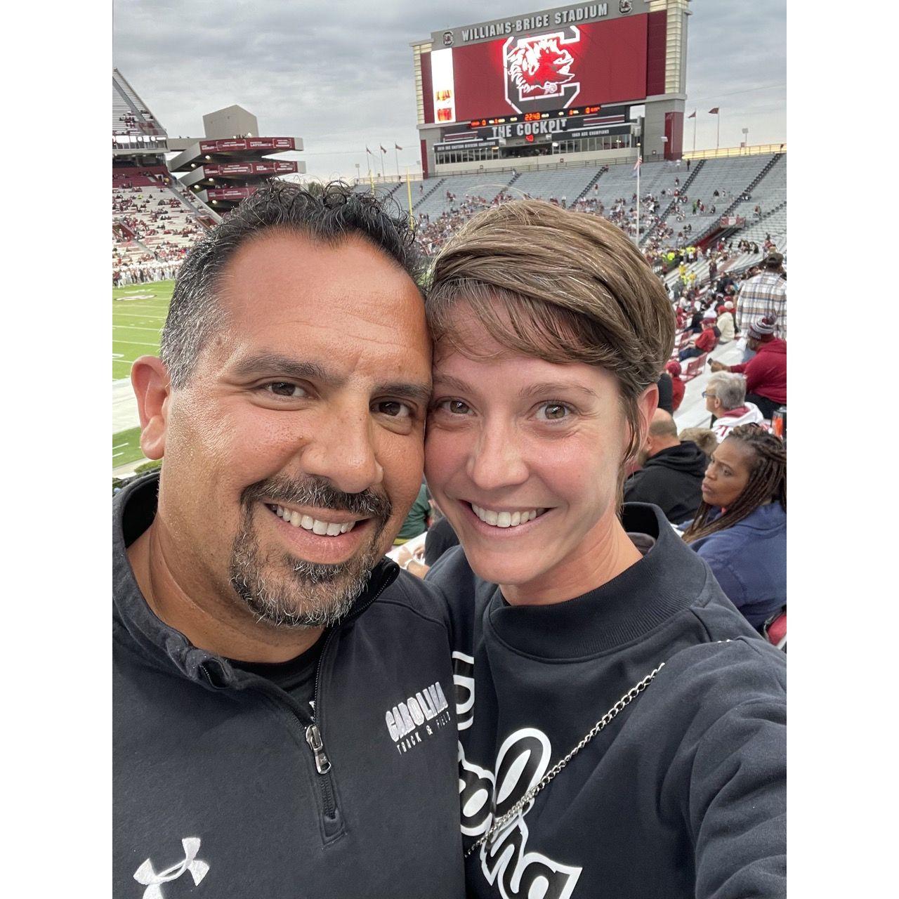 Karim actually got Melanie to put on a "Carolina" shirt, but she wouldn't take part in the chants.