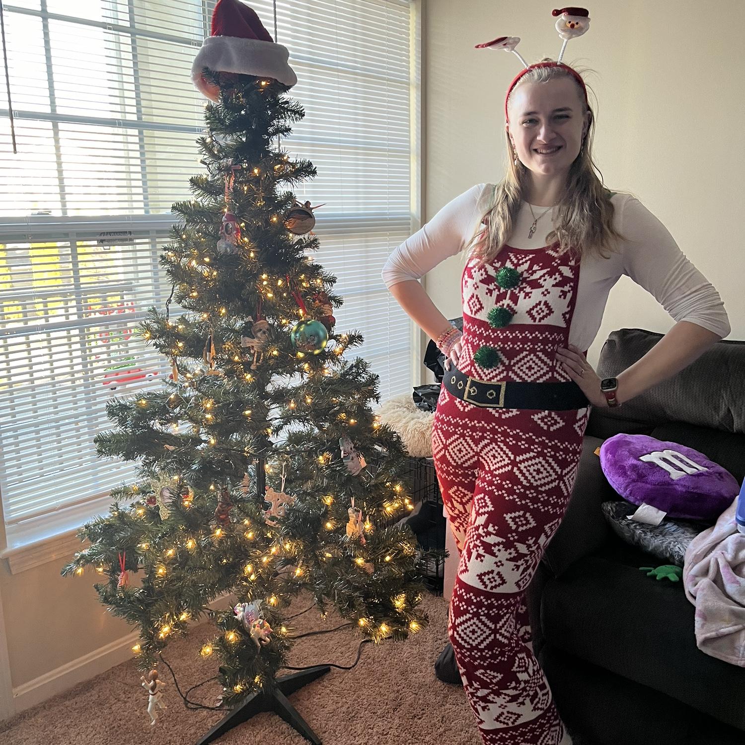 Our first Christmas tree/Lexi's tell me you're a teacher with out telling me you are a teacher look/she survived August to December 22 celebration picture!