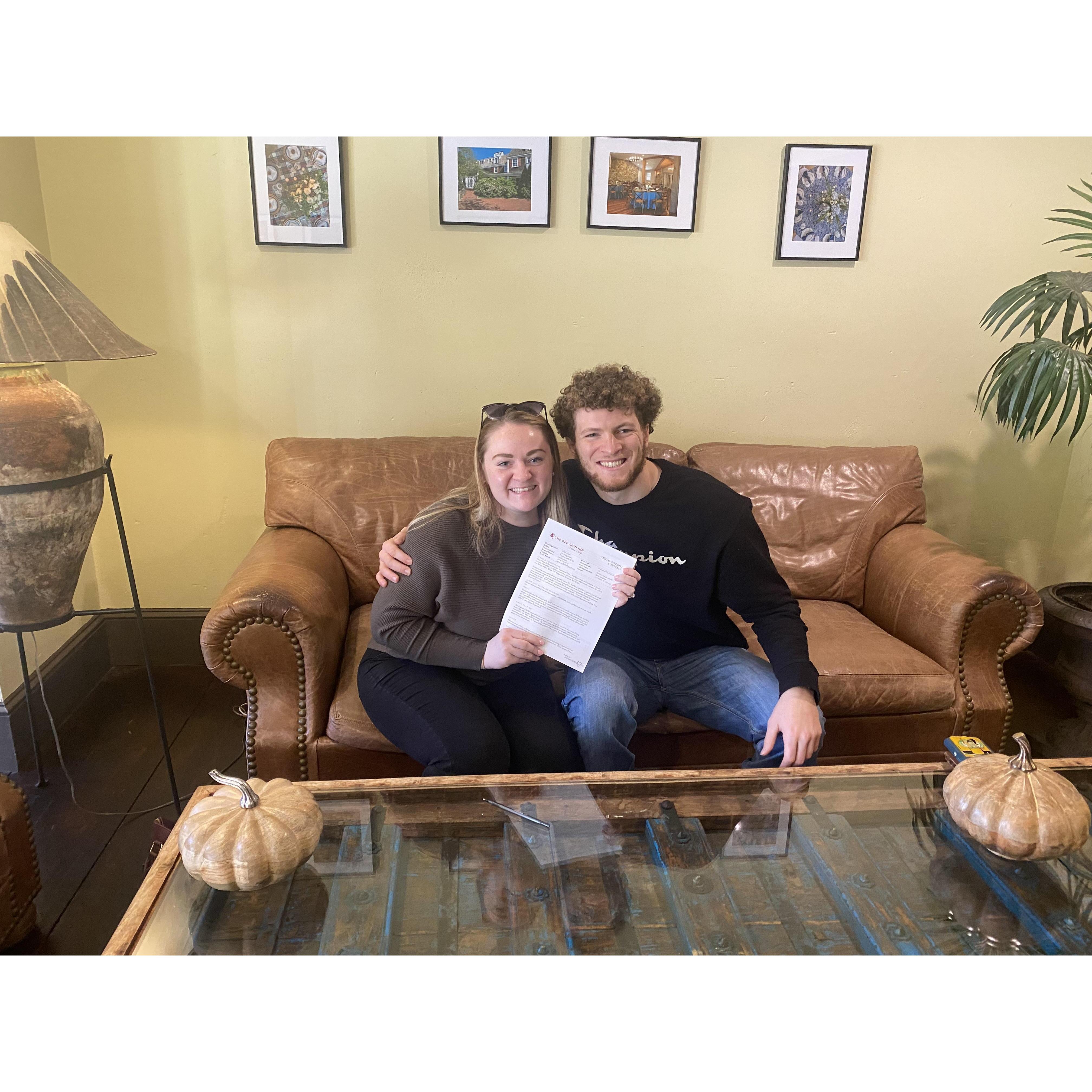 Signing our contract to lock in the Red Lion Inn!