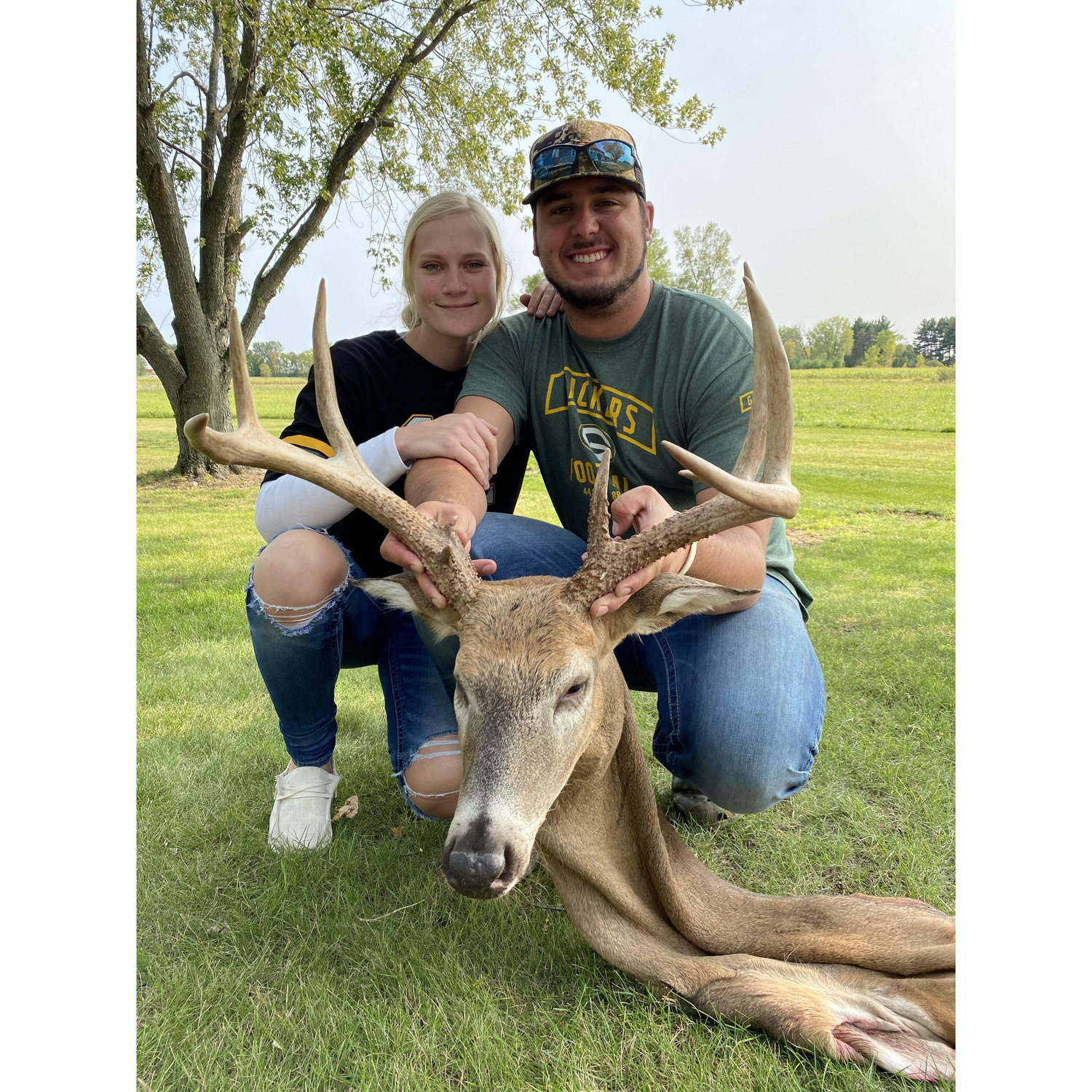 Celebrating Bradley's big deer!