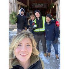 Fam Jam cutting the Christmas Tree!