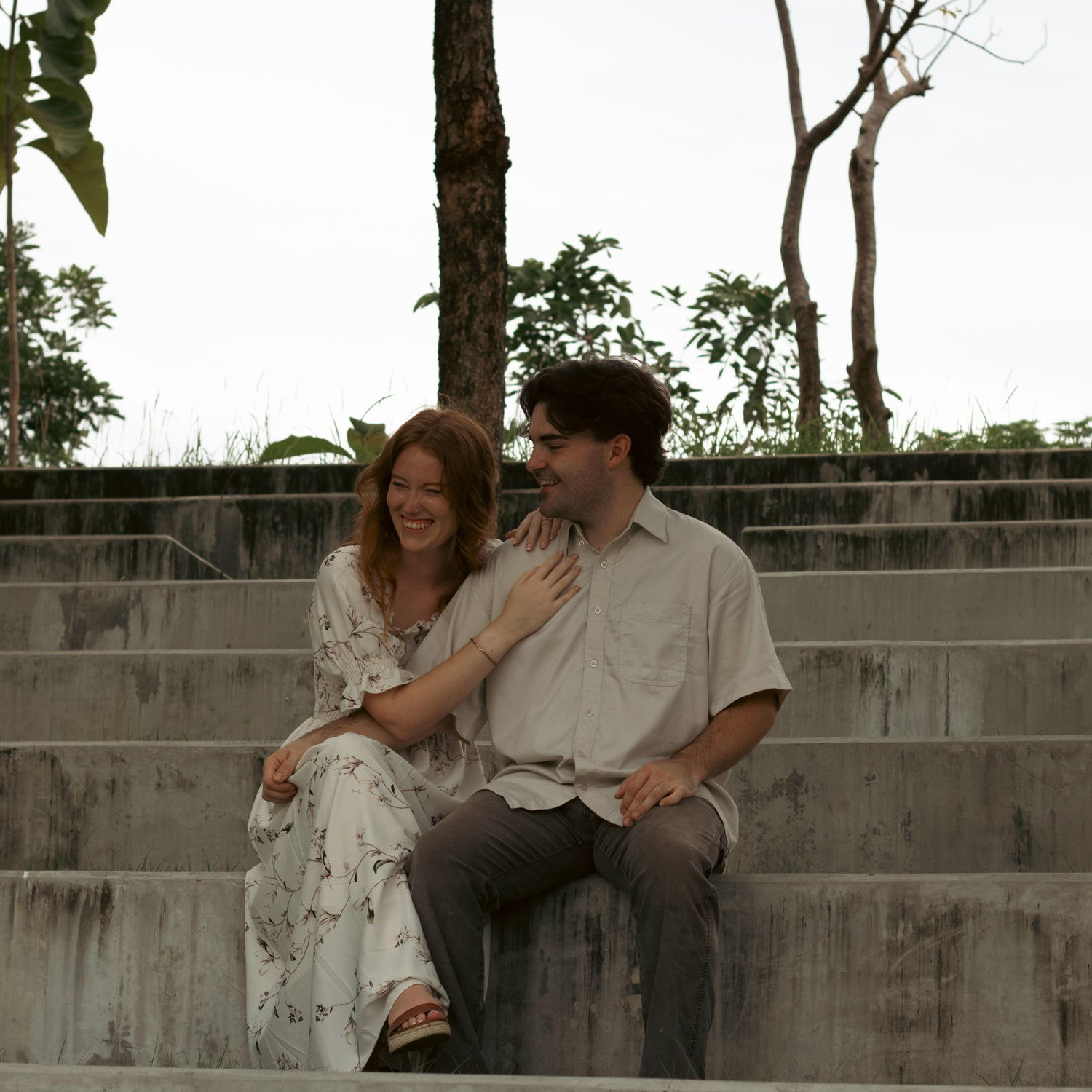 When we couldn't stop laughing because we were both melting from how hot and humid it was but were trying to stick it out for the engagement photos.