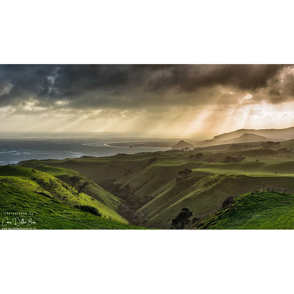 Take some time to explore the wild cliffs, black-sand beaches, and windswept hills of Āwhitu Peninsula