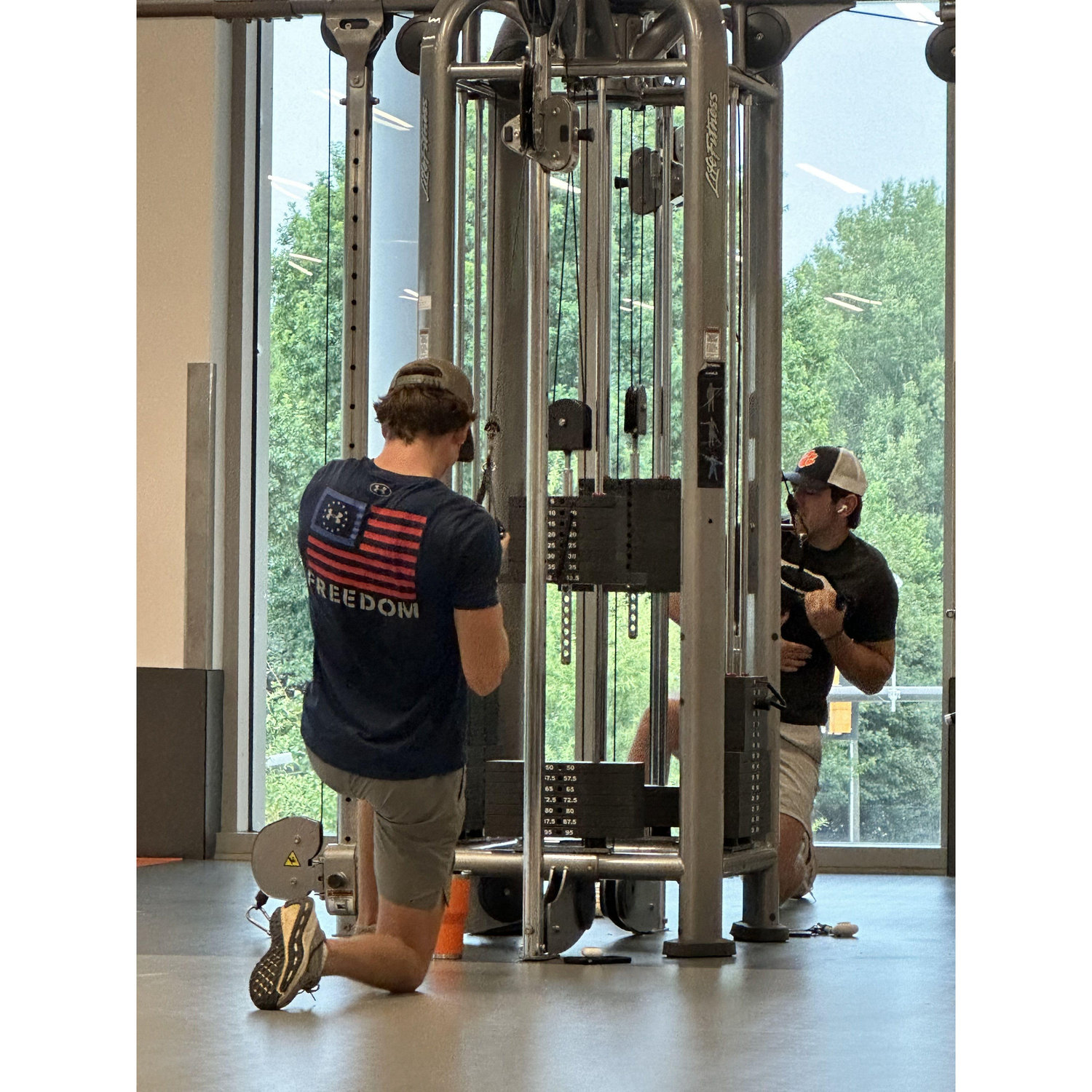 Rhame lifting weights at the gym. I knew he'd be down on one knee again one day ;)