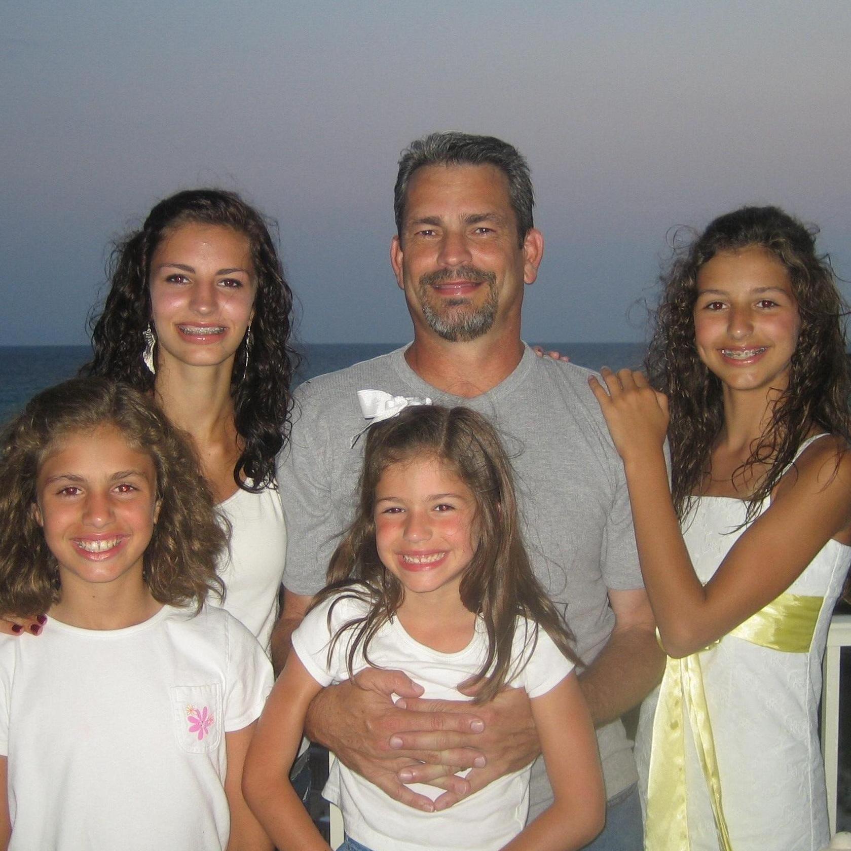 Justice's dad Johnny with all four of his girls-- Promise, Grace, Glory, and Justice