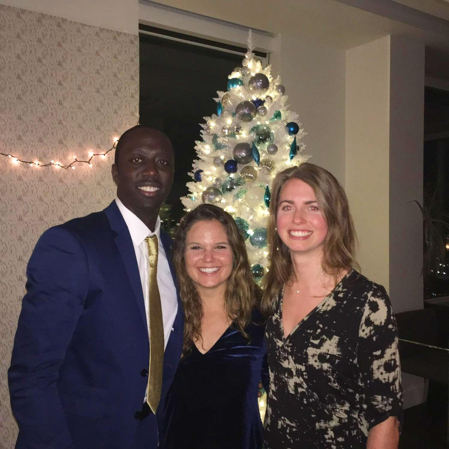 Our first photo together! The night we met in Seattle at a holiday party in 2017 featuring our cupid (Sarah Greenberg)!
