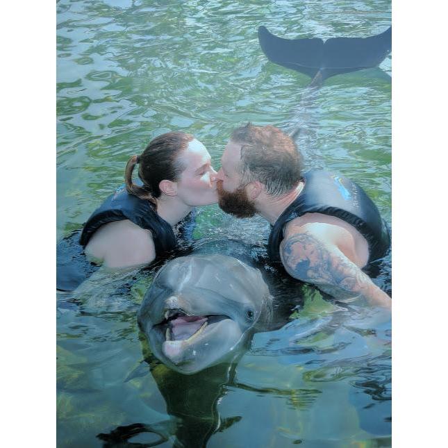Receiving our blessing from our dolphin friend!