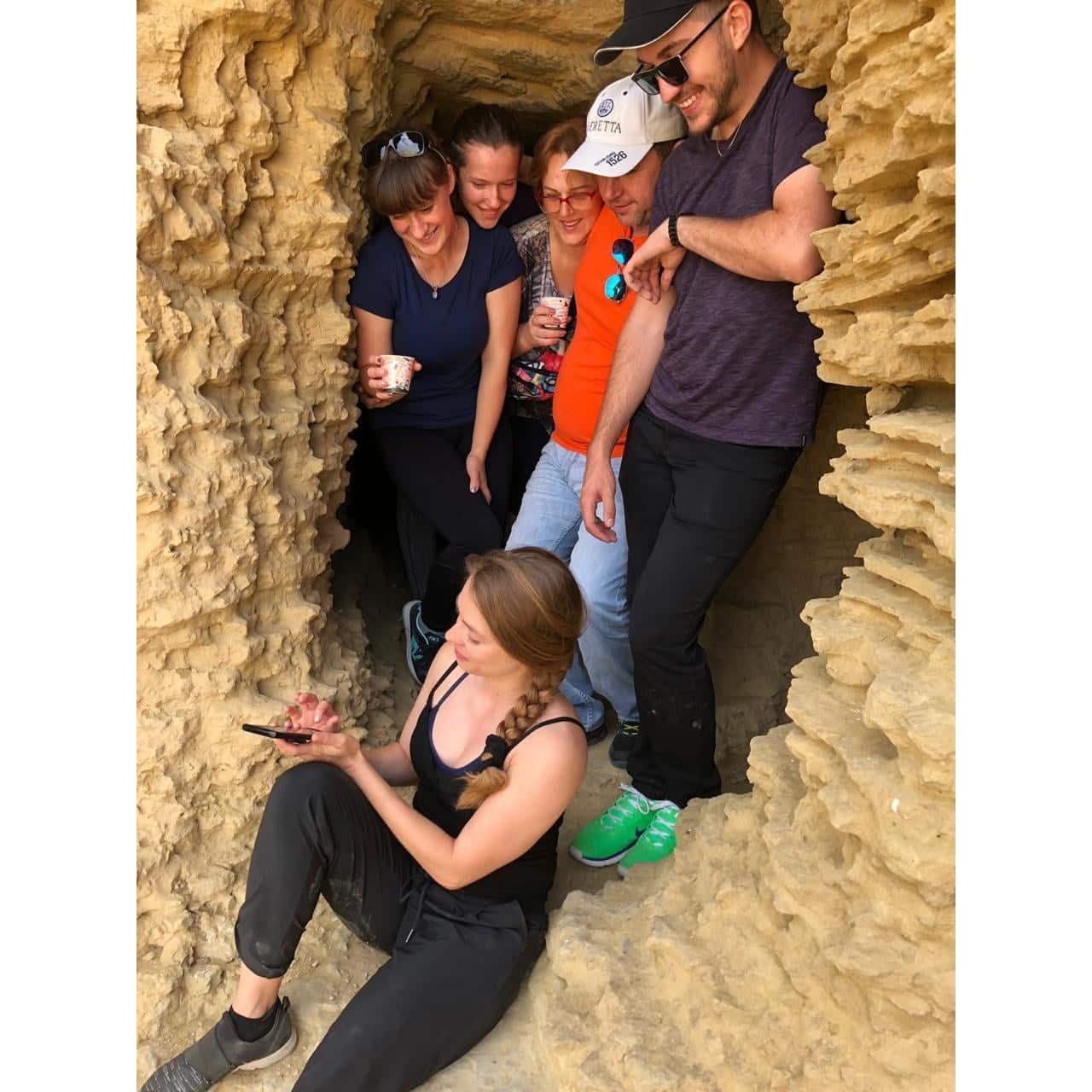 Stopped in the cave for tea, on our way to the proposal waterfall. From the left is Anya, Katya's cousin, Polina, Oleg's sister, Sveta, Oleg's second mom, Andrey Doronin, Oleg's father.