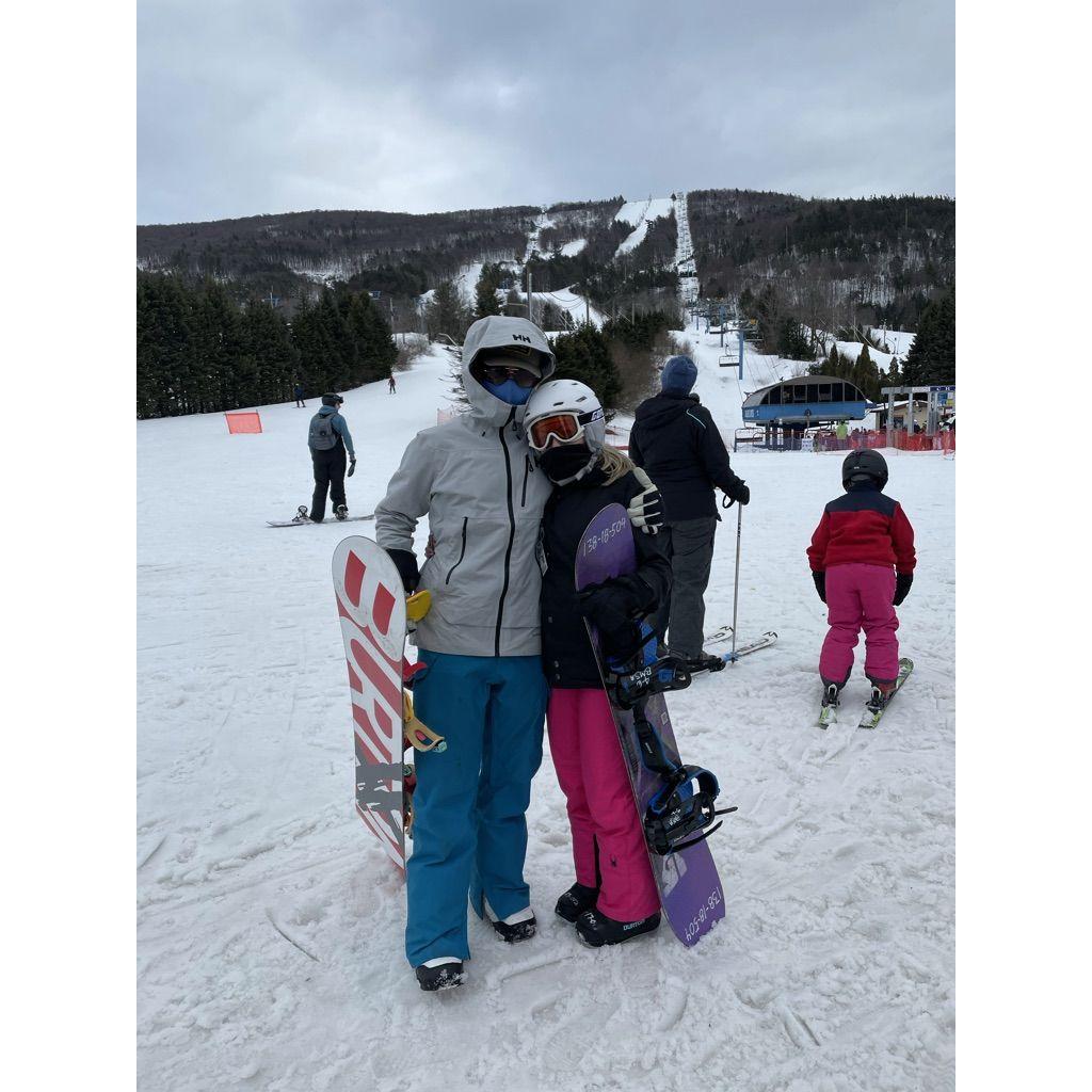 Joe teaches Amanda to snowboard. There were no arguments.