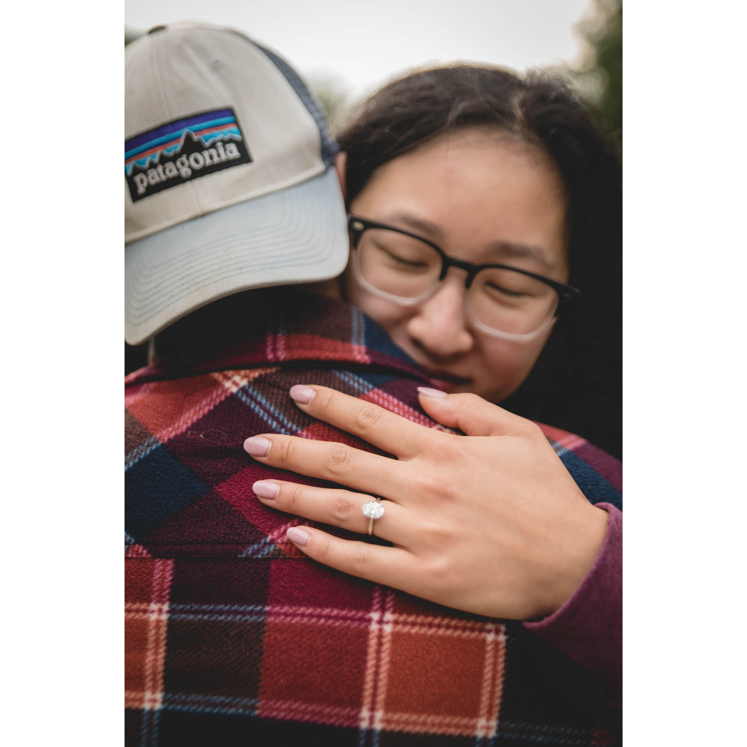 Our engagement took place at 5am on a quiet beach in Washington. This was moments after Natasha spotted two of our friends hiding behind a bush, but was too sleepy to make sense of it. Jose got lucky!