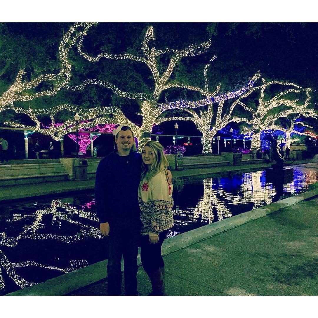 Houston, TX Zoo Lights. He was so excited he won something in a raffle here.