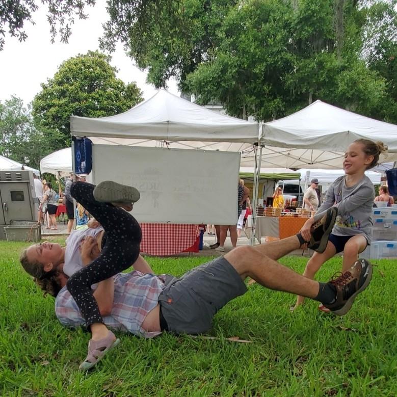 Dave horsin' around with Lizzie's twin nieces, Ry and Liv - visiting Lizzie in FL during summer 2021 while she had an internship there