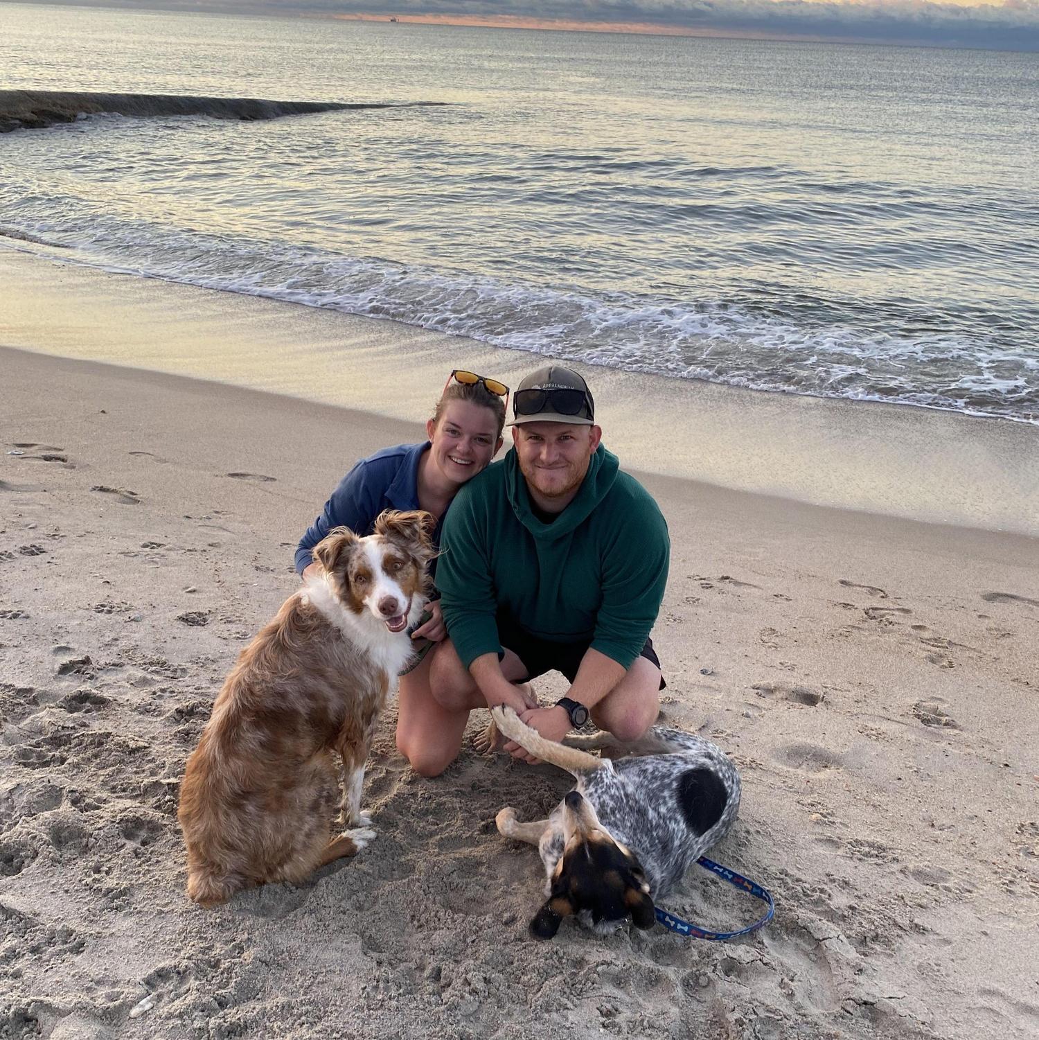 Us with our dogs, Mowgli (left) and Frank (right). <3