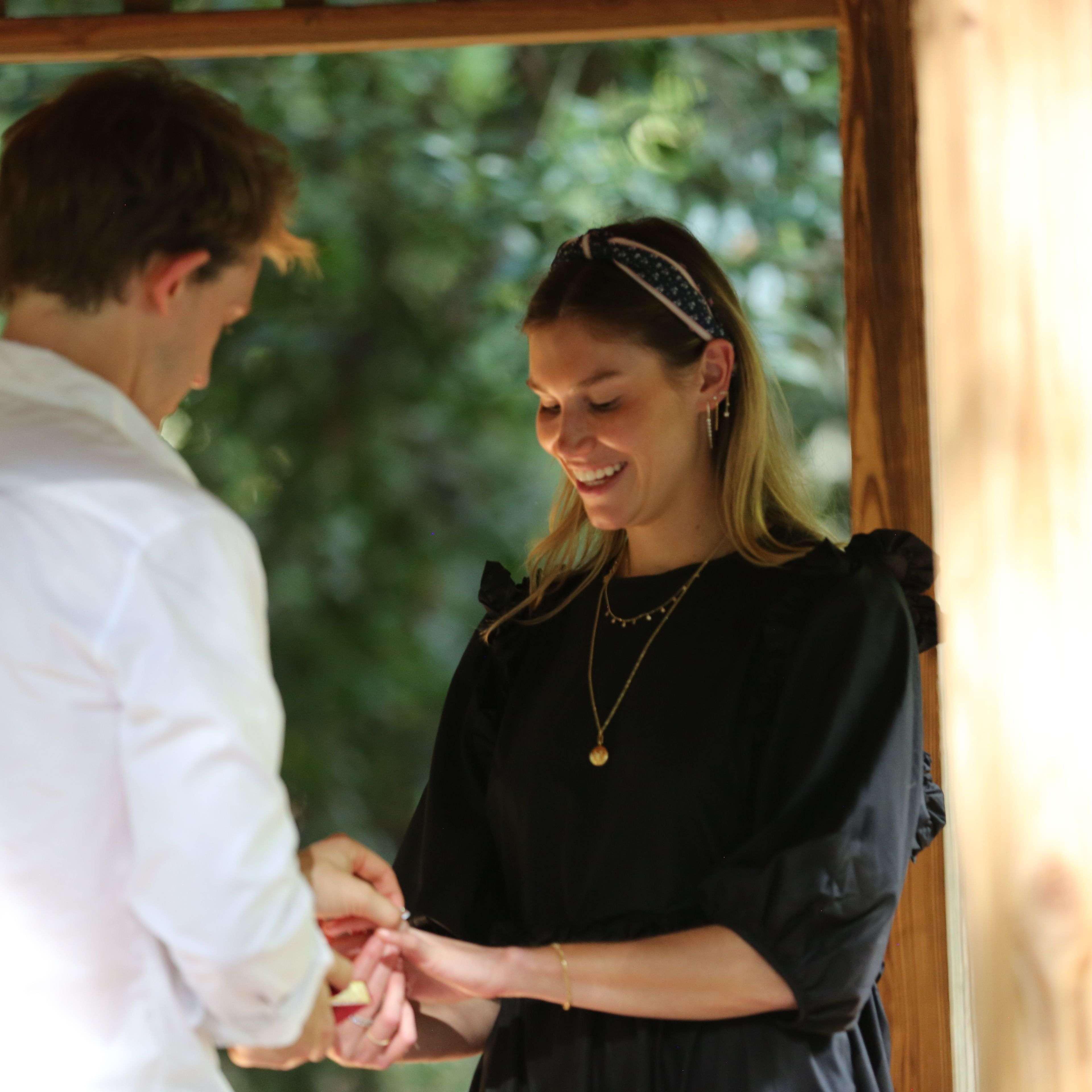 Max planned a surprise proposal at Lake Norman and we met our family and close friends afterwards. 