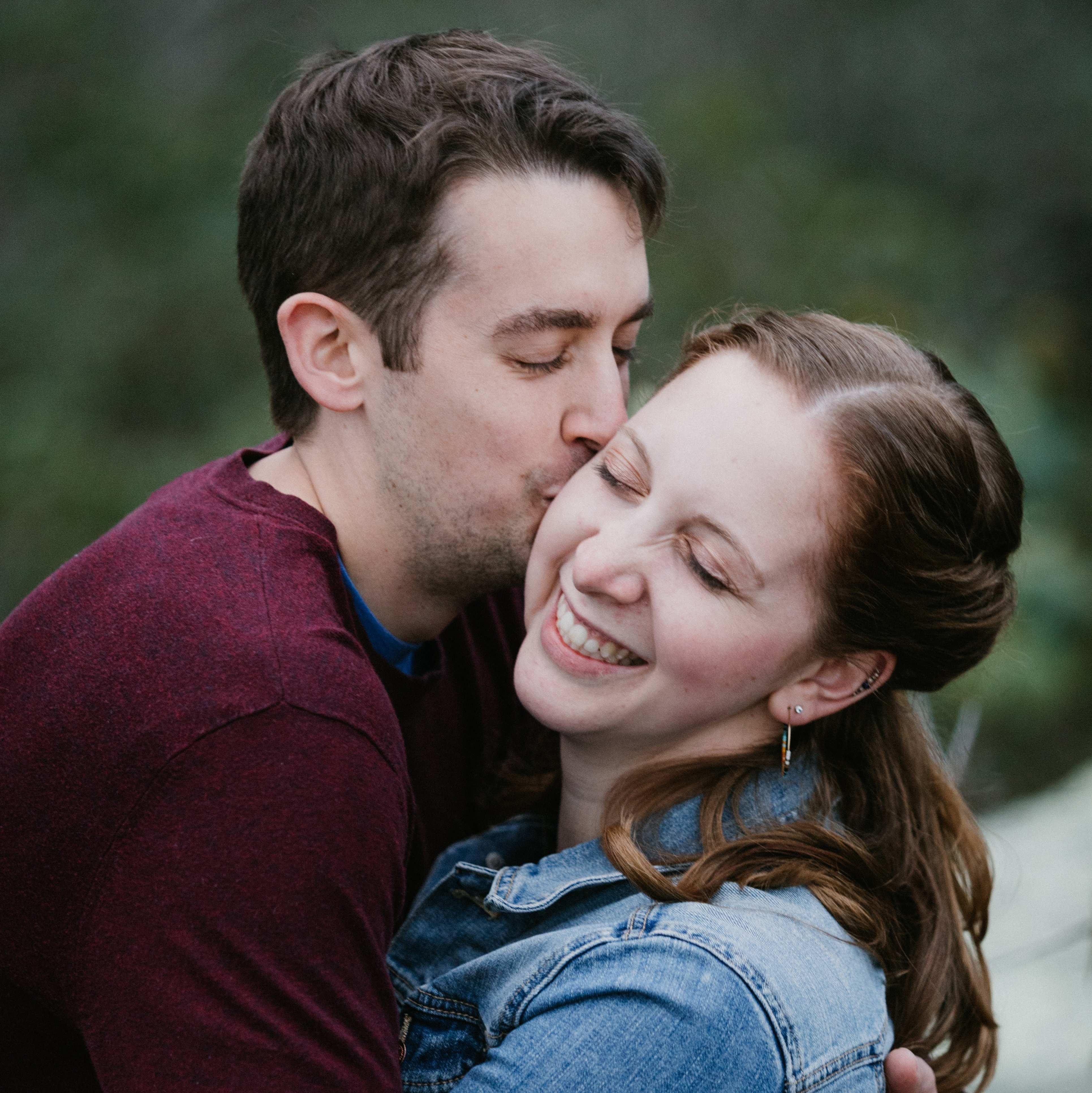 A sweet smooch at our engagement shoot