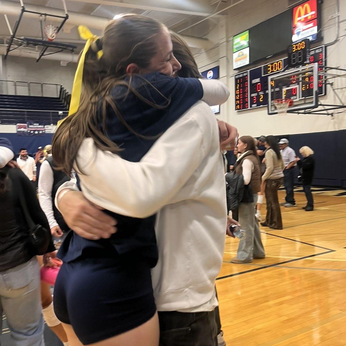 Big hugs after winning the Conference Tournamet