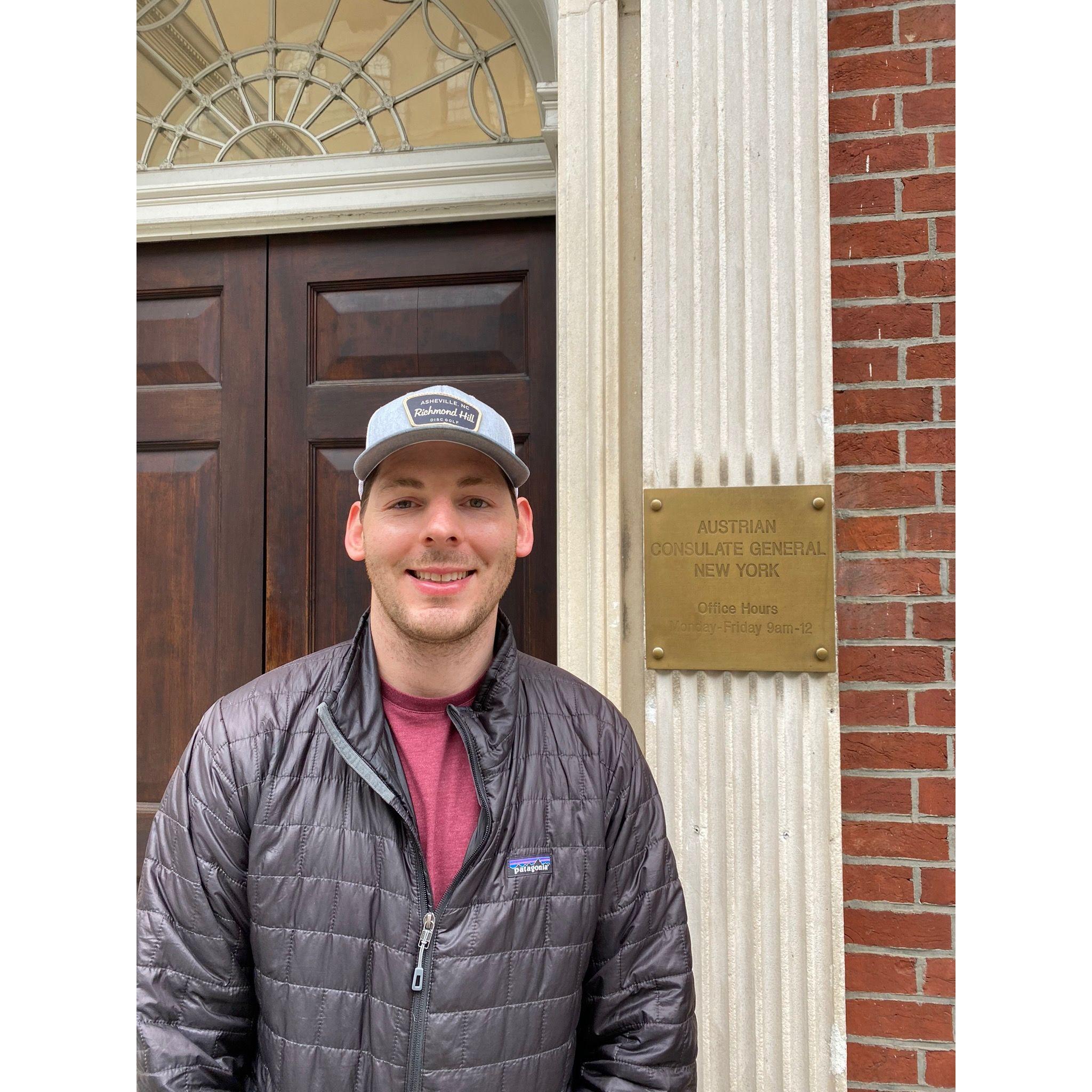 Marc outside of the Austrian embassy where he picked up his Austrian passport!