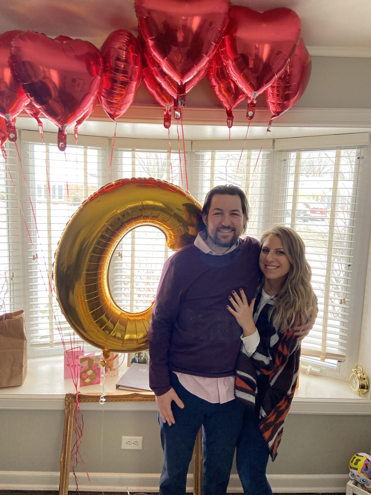 Celebrating our engagement at an event planned by Janice’s Party Planning Committee*
*Laura Reynolds