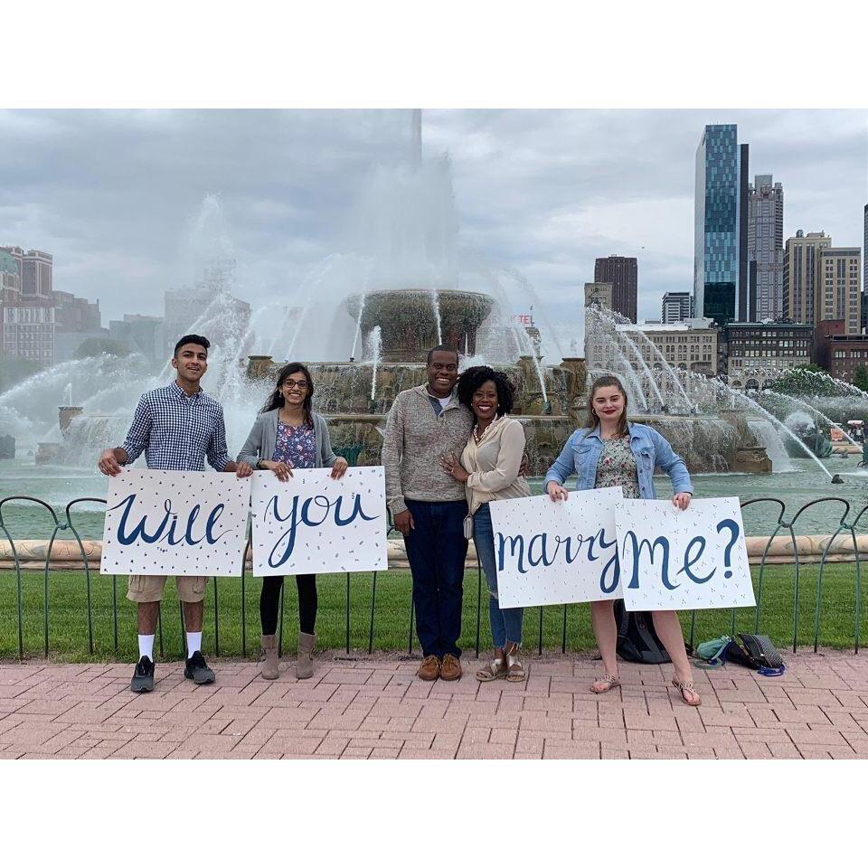 Jason had some of his Mock Trial students hold up these signs when he proposed!