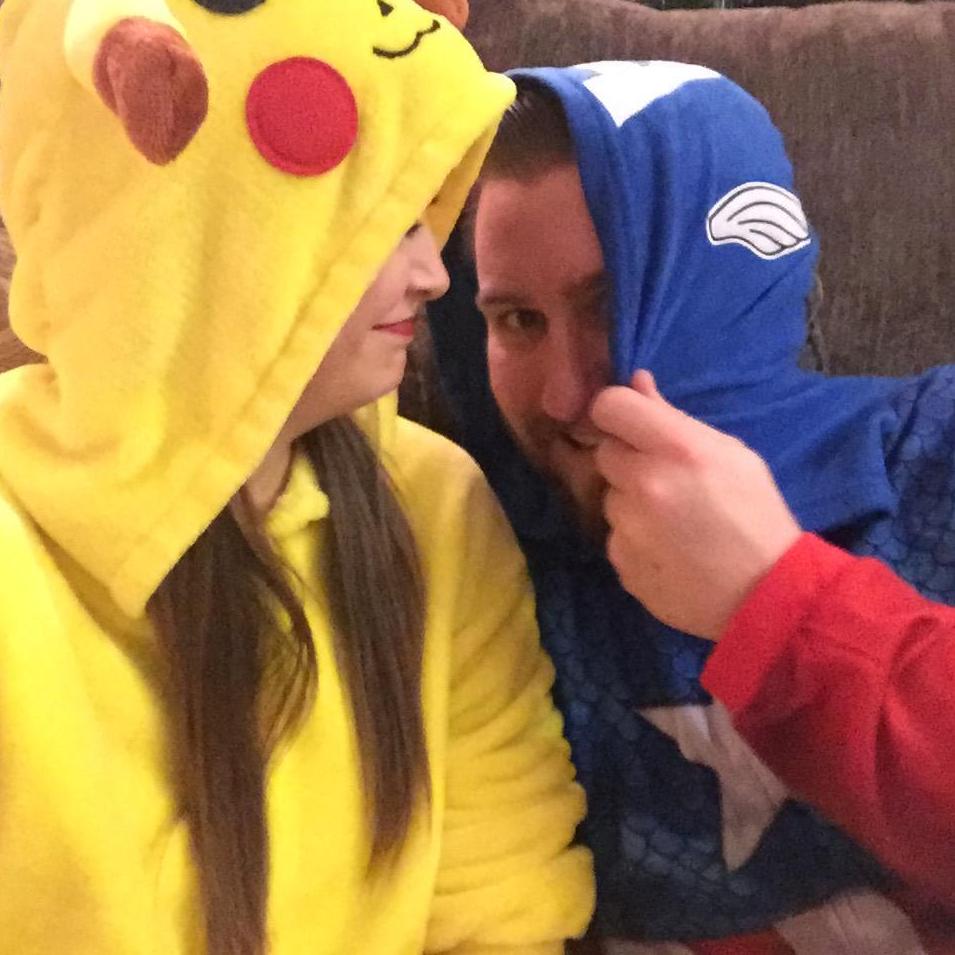New Years Eve onsie party. Pikachu and Captain America.