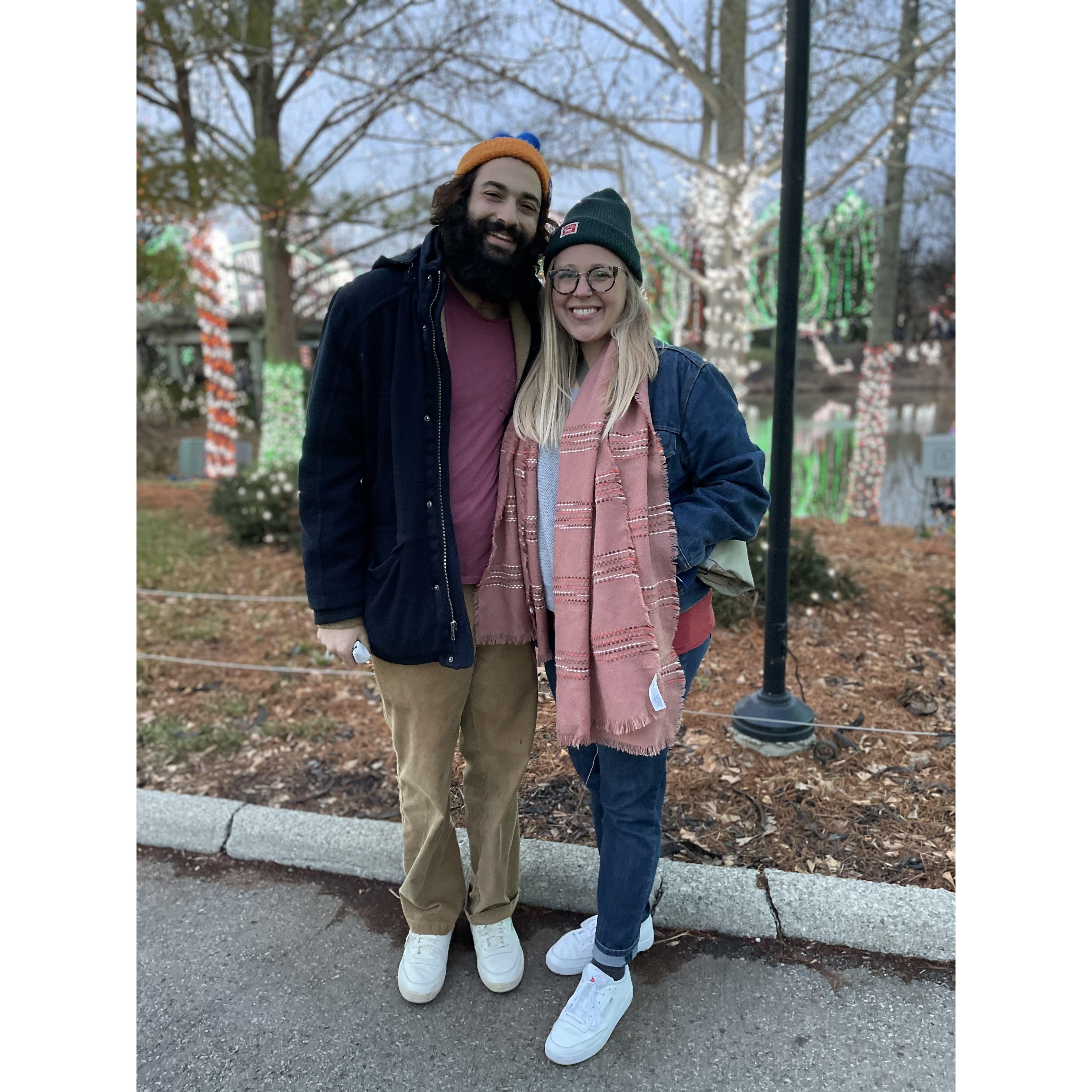 Annie takes Bobby to one of her favorite winter festivities in Ohio: the Columbus Zoo lights. The two wear very similar shoes. December 2021.