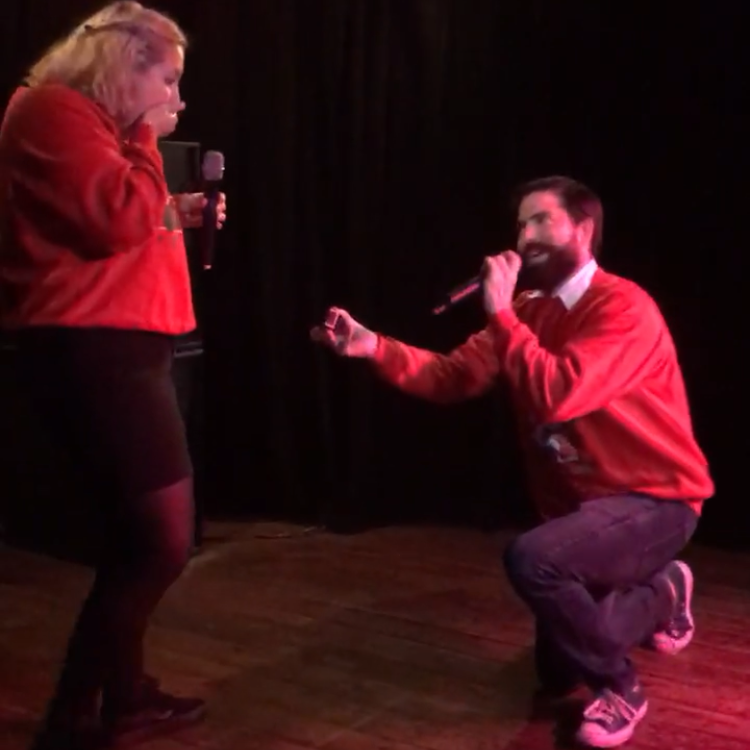 Scott popping the question at Kajun's Pub