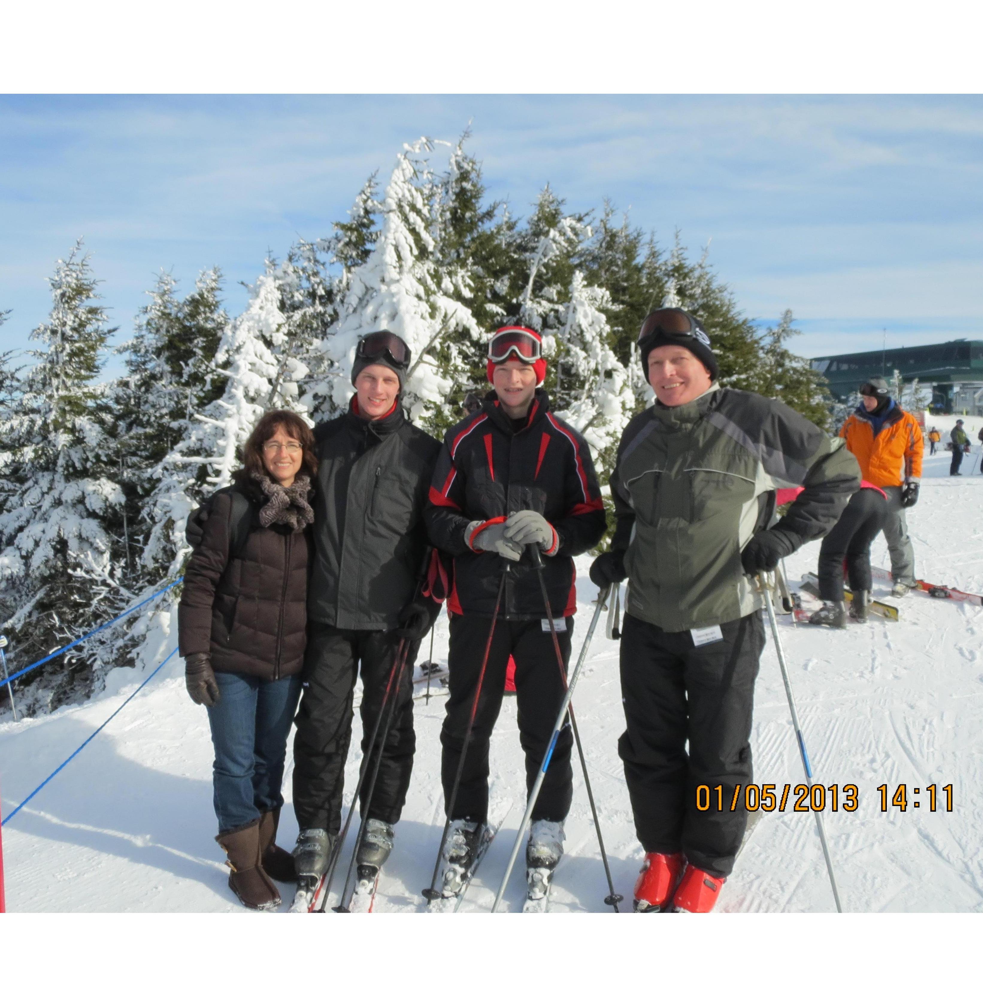 A sweet family photo of Anthony, David, Tim, and Melanie Wieck.