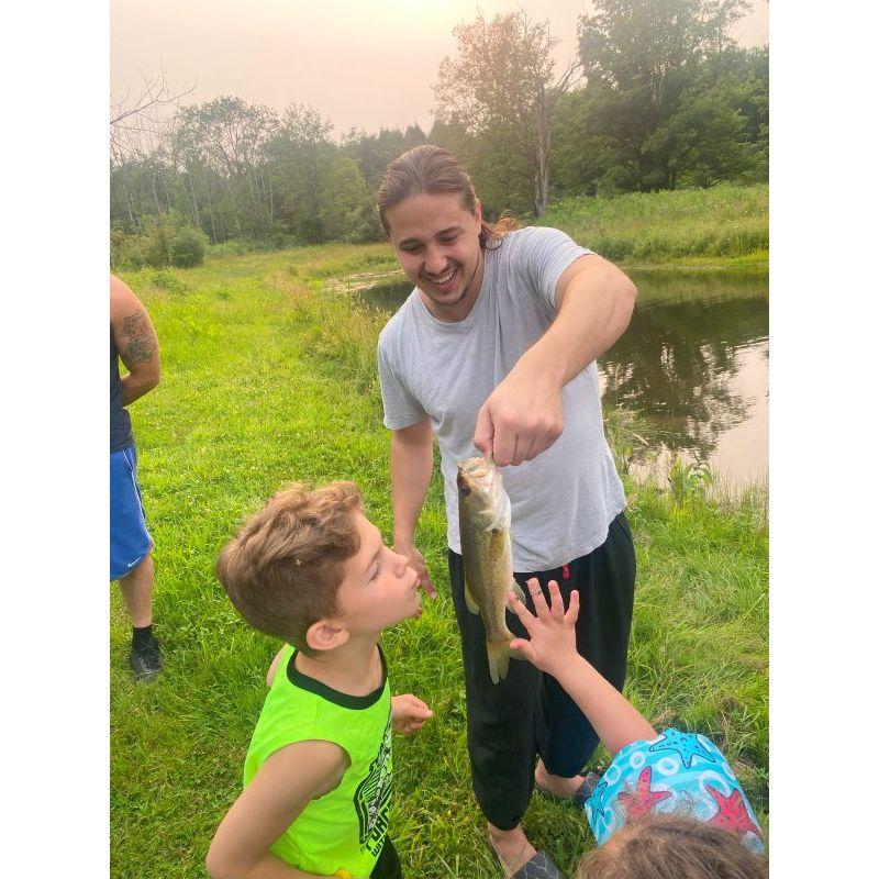 Showing off fishing skills