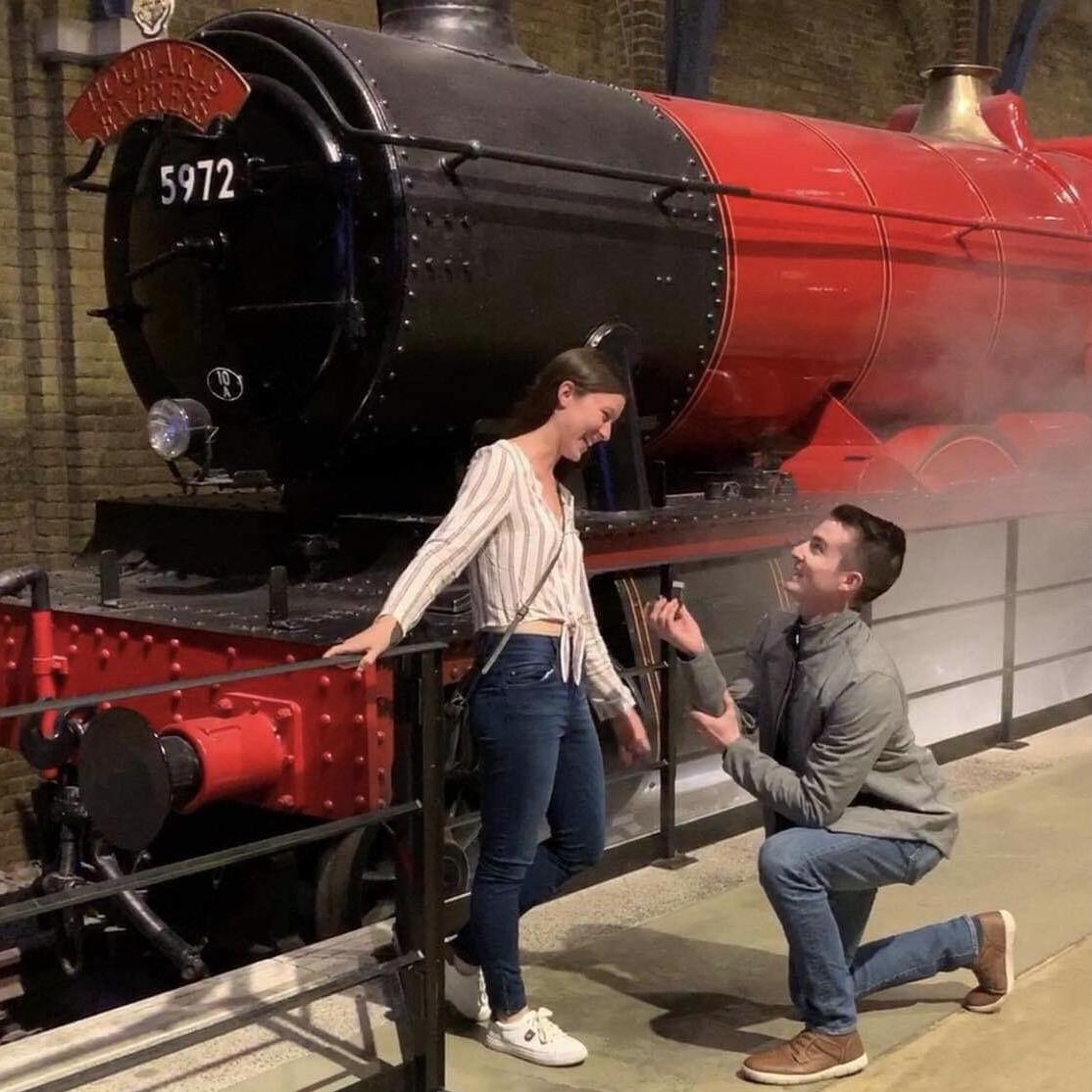 The Proposal! In front of the Hogwarts Express at the Harry Potter Studio Tour in London, England.