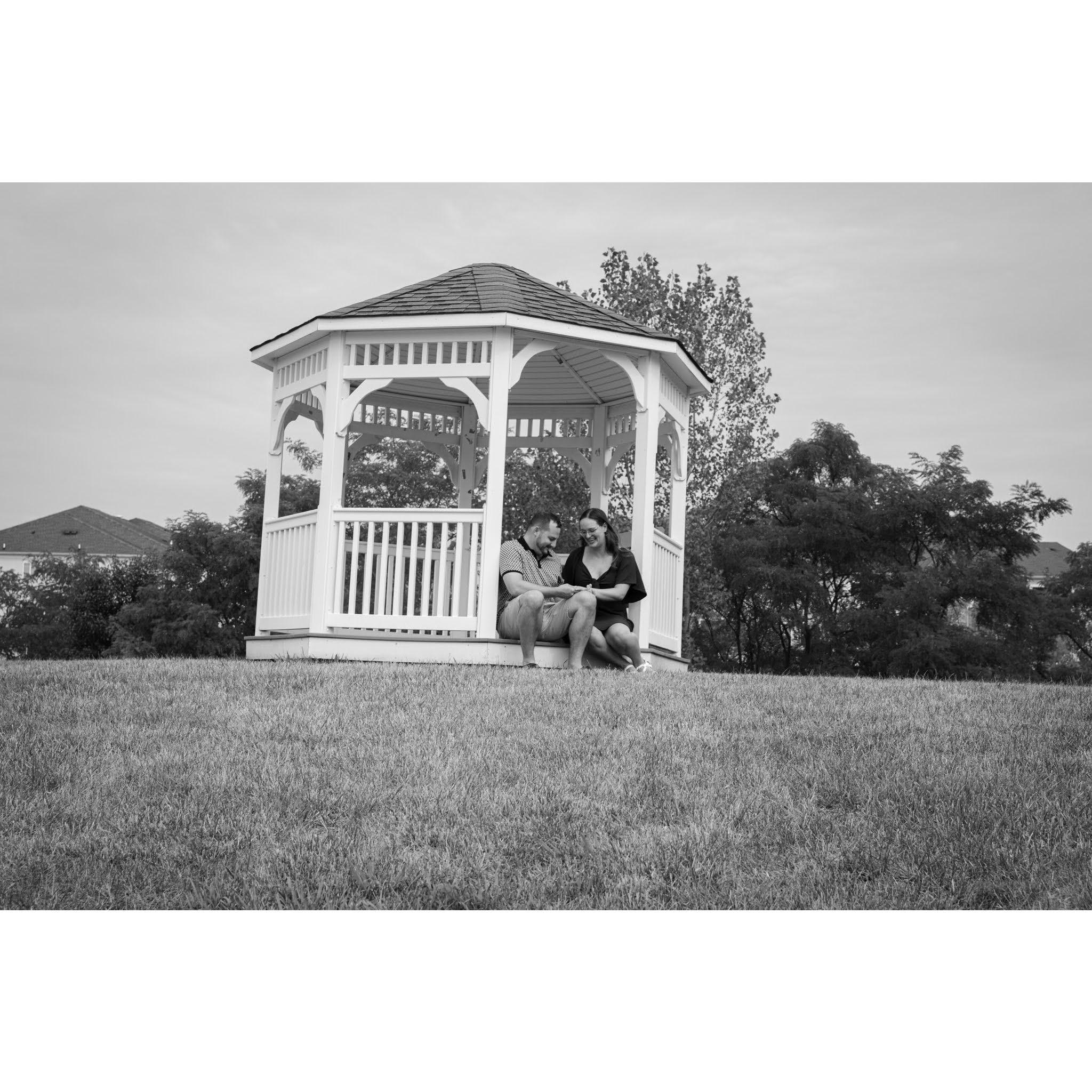 Travis proposed on a gazebo up the hill.