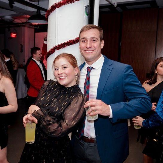 Our first photo together was at the holiday party we met at.